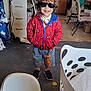 Braydon joined the competition — help win amazing prizes! child, sunglasses, red_jacket, spiderman, shorts, indoor, carpet, smiling, person, furniture, chair, laundry_basket, high_chair, cabinet, people, household_items, casual_clothing, messy_room, happy, portrait