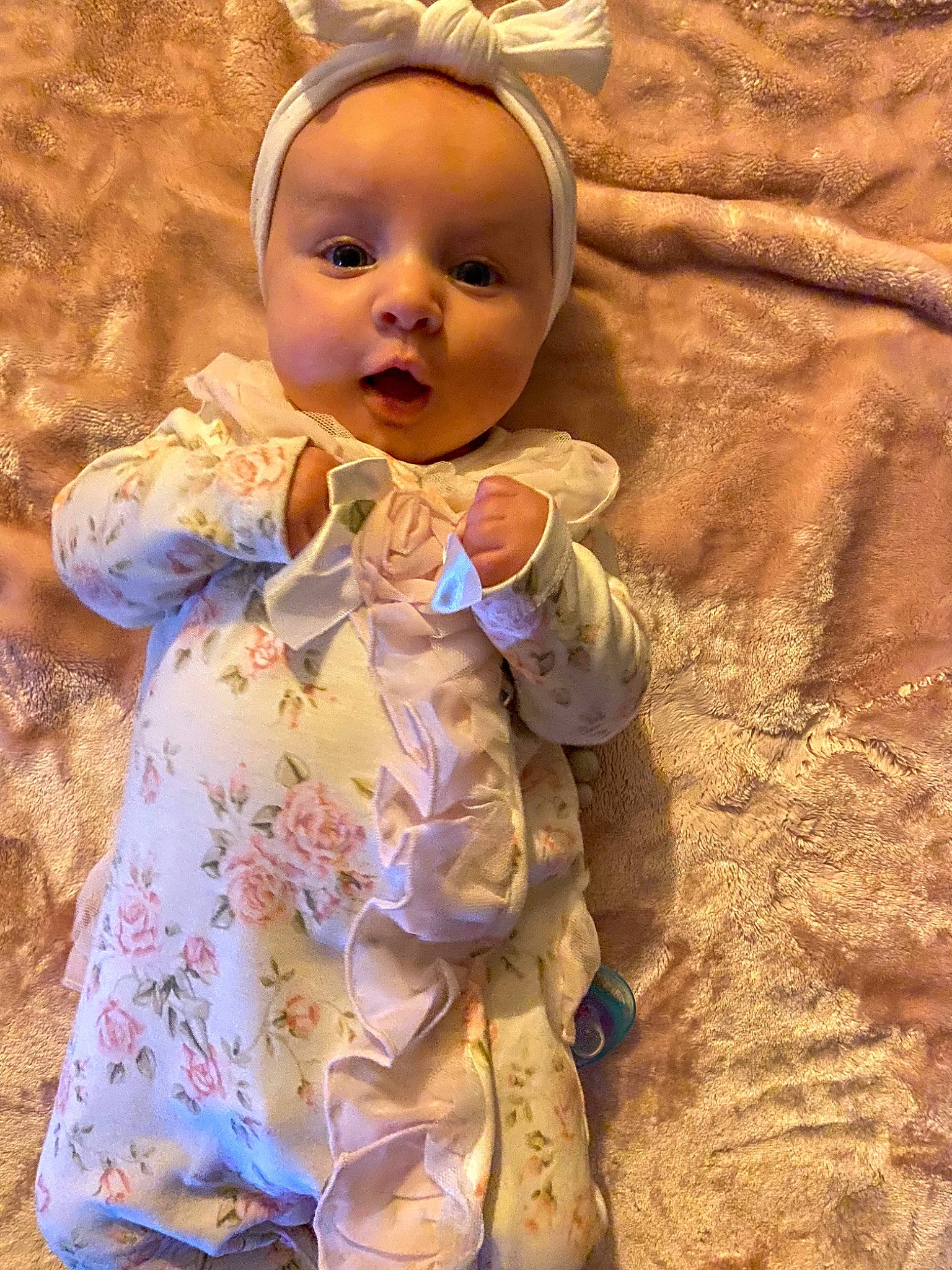 Fletcher is registered to the contest to win money with this photo: baby, baby_products, baby_toddler_clothing, beauty, child, dress, eye, face, fun, happy, human_body, linens, pattern, peach, people_in_nature, person, photograph, skin, sleeve, soil