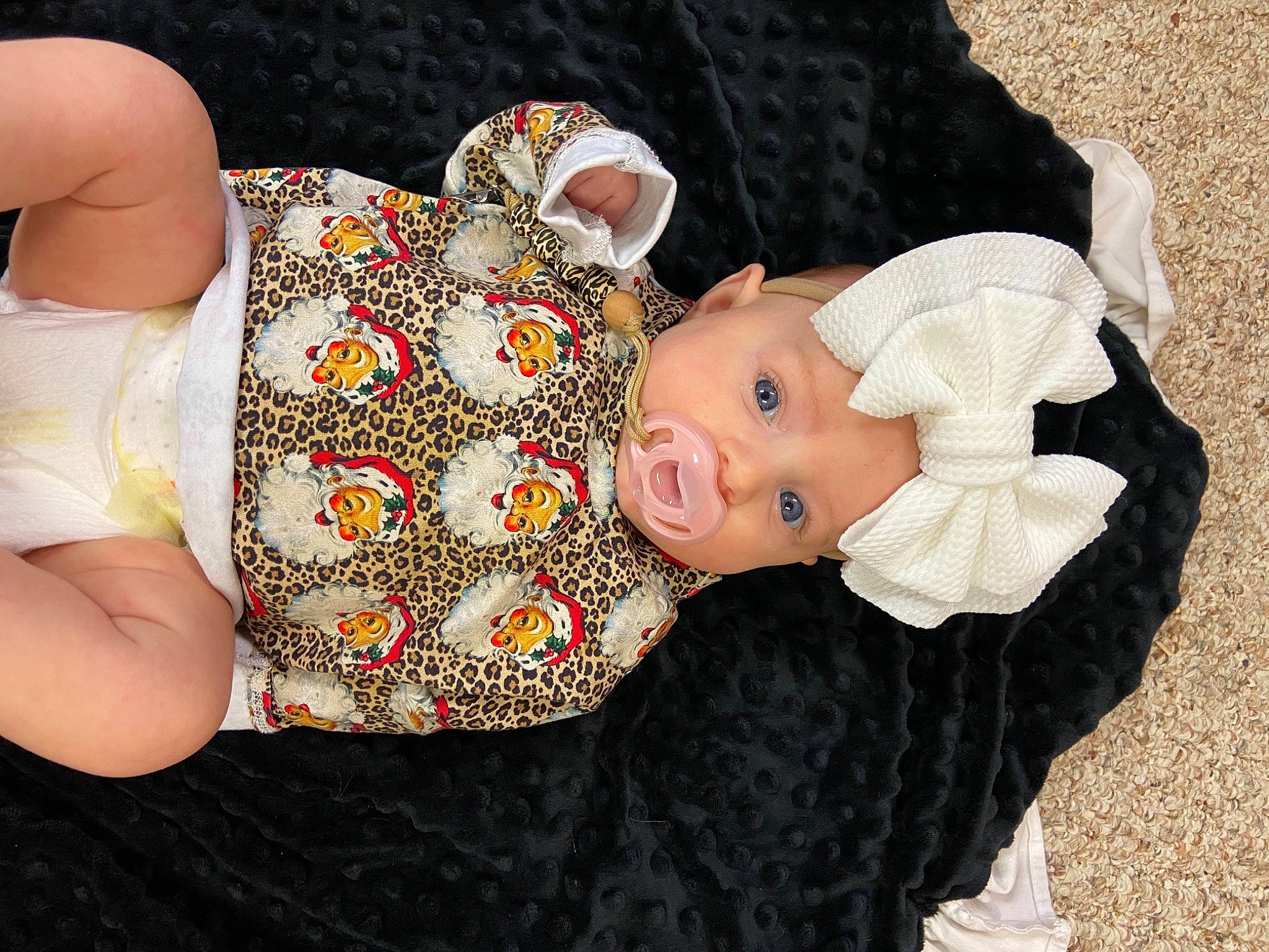 Fletcher joined the competition — help win amazing prizes! baby, baby_products, baby_toddler_clothing, cheek, child, comfort, doll, fashion_accessory, grass, happy, headgear, headwear, human_body, human_leg, person, sitting, skin, sleeve, textile, thigh