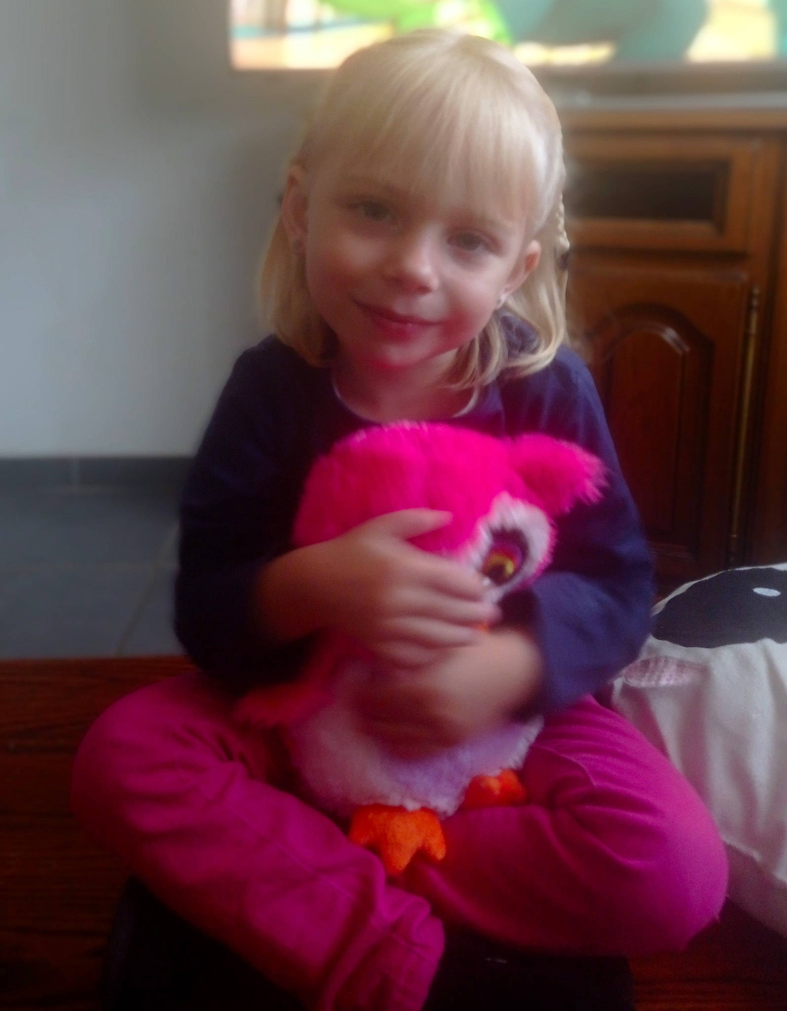 Inaya participe au concours pour gagner de l'argent avec cette photo : arm, baby_playing_with_toys, baby_toddler_clothing, child, finger, flooring, fun, joy, magenta, person, pink, plush, purple, rabbit, sitting, stuffed_toy, teddy_bear, thumb, toddler, toy