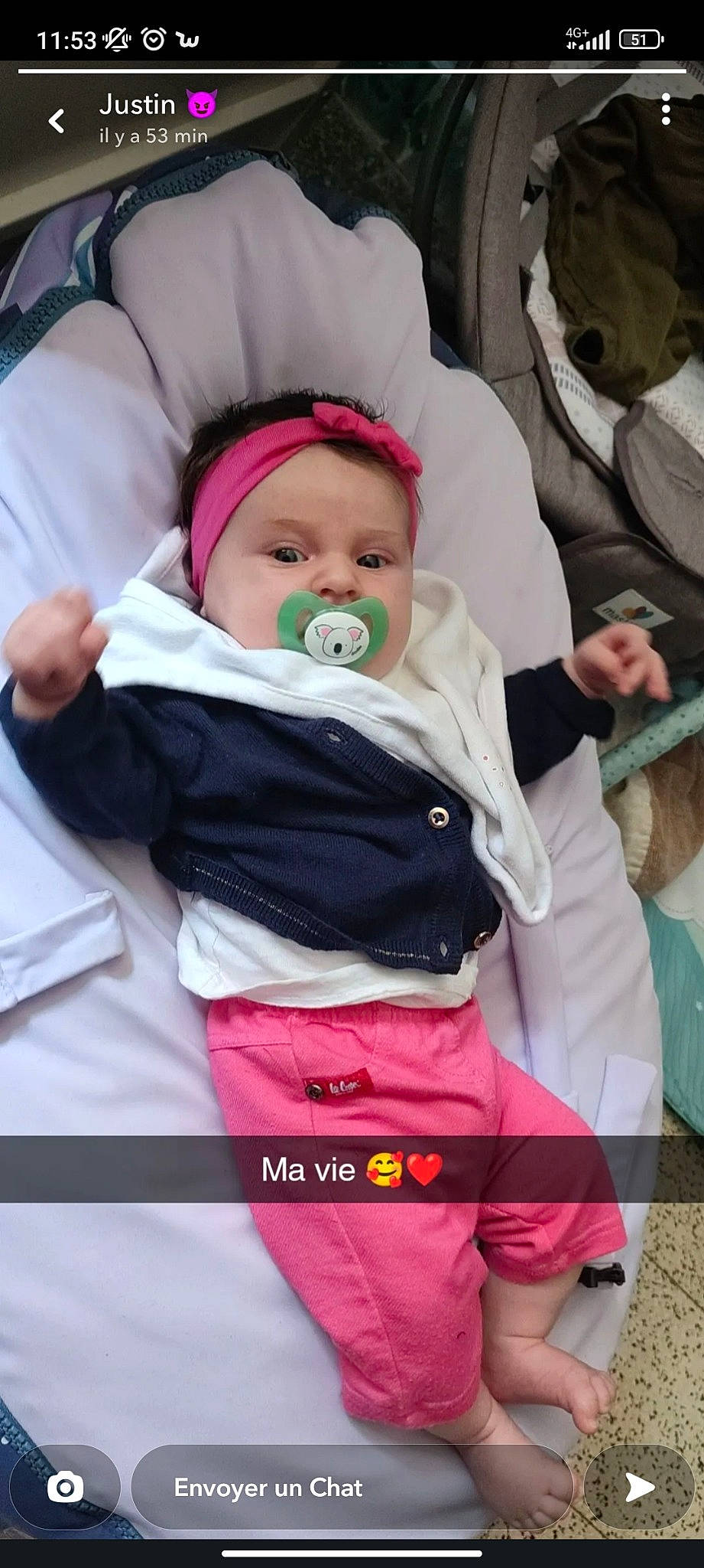 Eva participe au concours pour gagner de l'argent avec cette photo : baby, baby_carriage, baby_products, baby_safety, baby_toddler_clothing, cheek, child, comfort, happy, linens, magenta, person, room, sitting, sleeve, toddler, winter