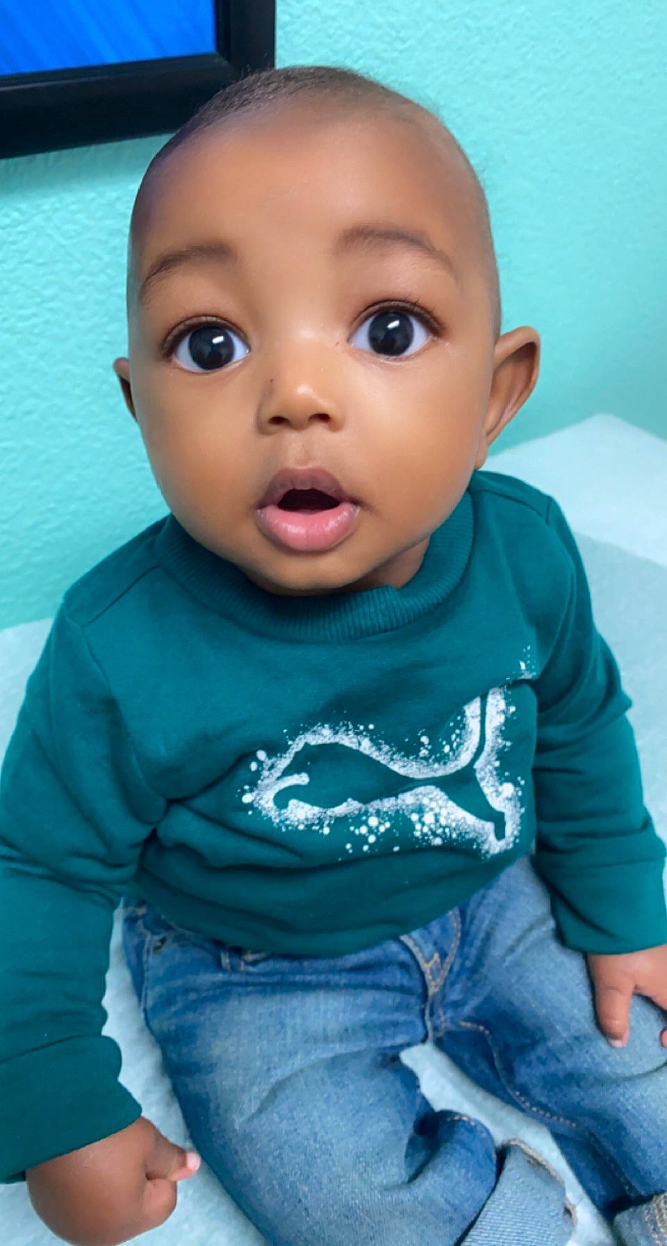 Khamari is registered to the contest to win money with this photo: azure, baby, baby_toddler_clothing, blue, cheek, chin, cool, eyebrow, eyelash, happy, iris, lip, mouth, nose, organ, person, skin, sleeve, surprise, t_shirt