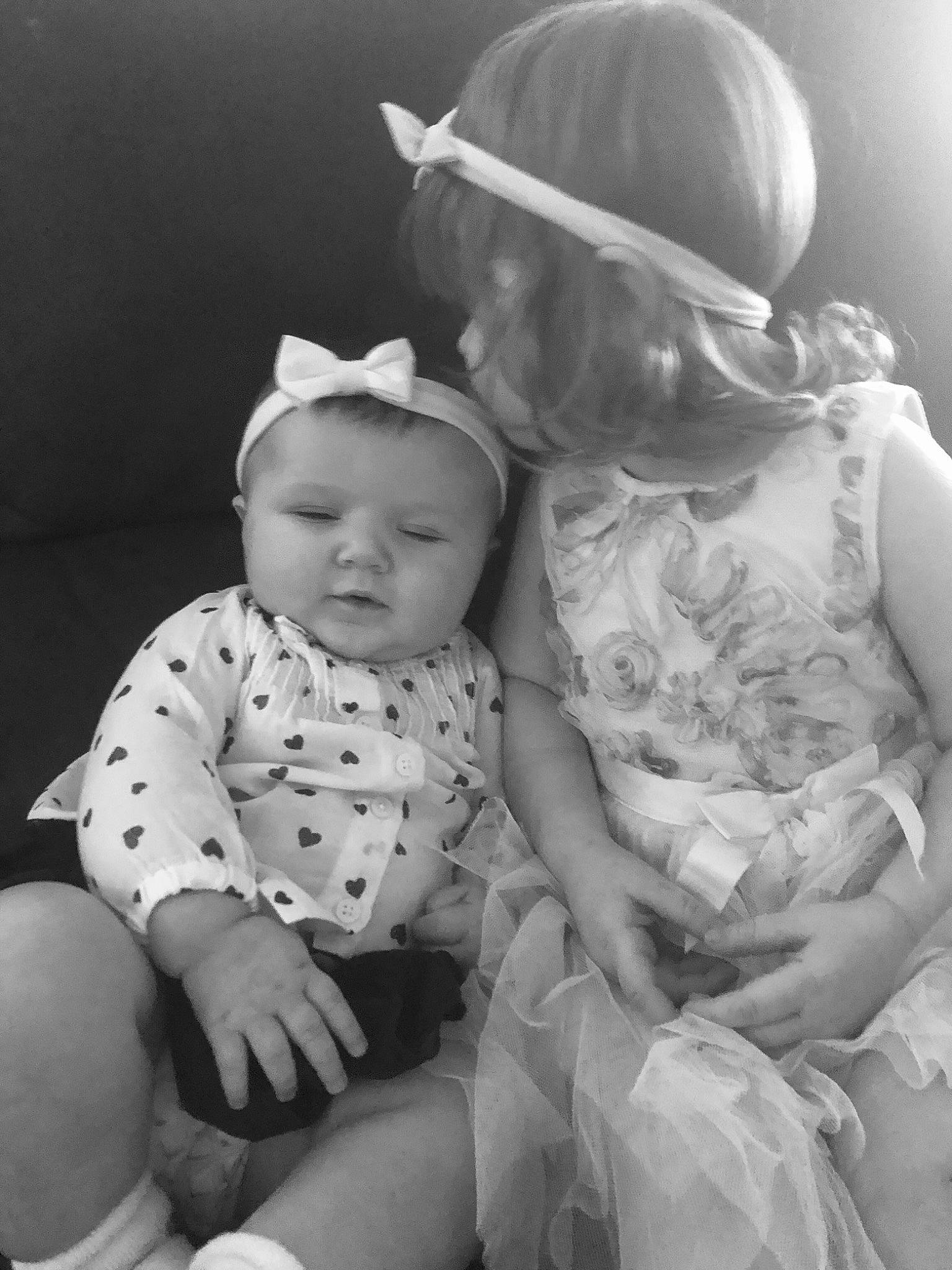 Amelia joined the competition — help win amazing prizes! baby, birth, black_and_white, bonnet, child, family, hat, headgear, monochrome, monochrome_photography, people, person, photograph, photography, sibling, sitting, smile, snapshot, stock_photography, toddler