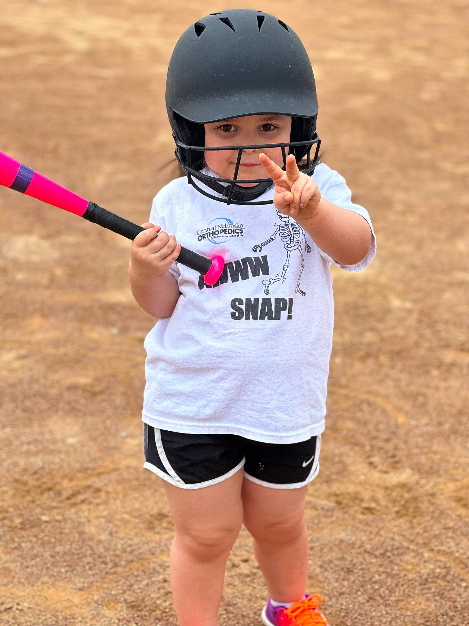 Jocelyn is registered to the contest to win money with this photo: baseball, baseball_bat, baseball_equipment, baseball_field, baseball_park, baseball_player, baseball_protective_gear, baseball_uniform, bat_and_ball_games, batting_glove, clothing, glove, headwear, helmet, human_body, jersey, person, shorts, softball_bat, sports_equipment