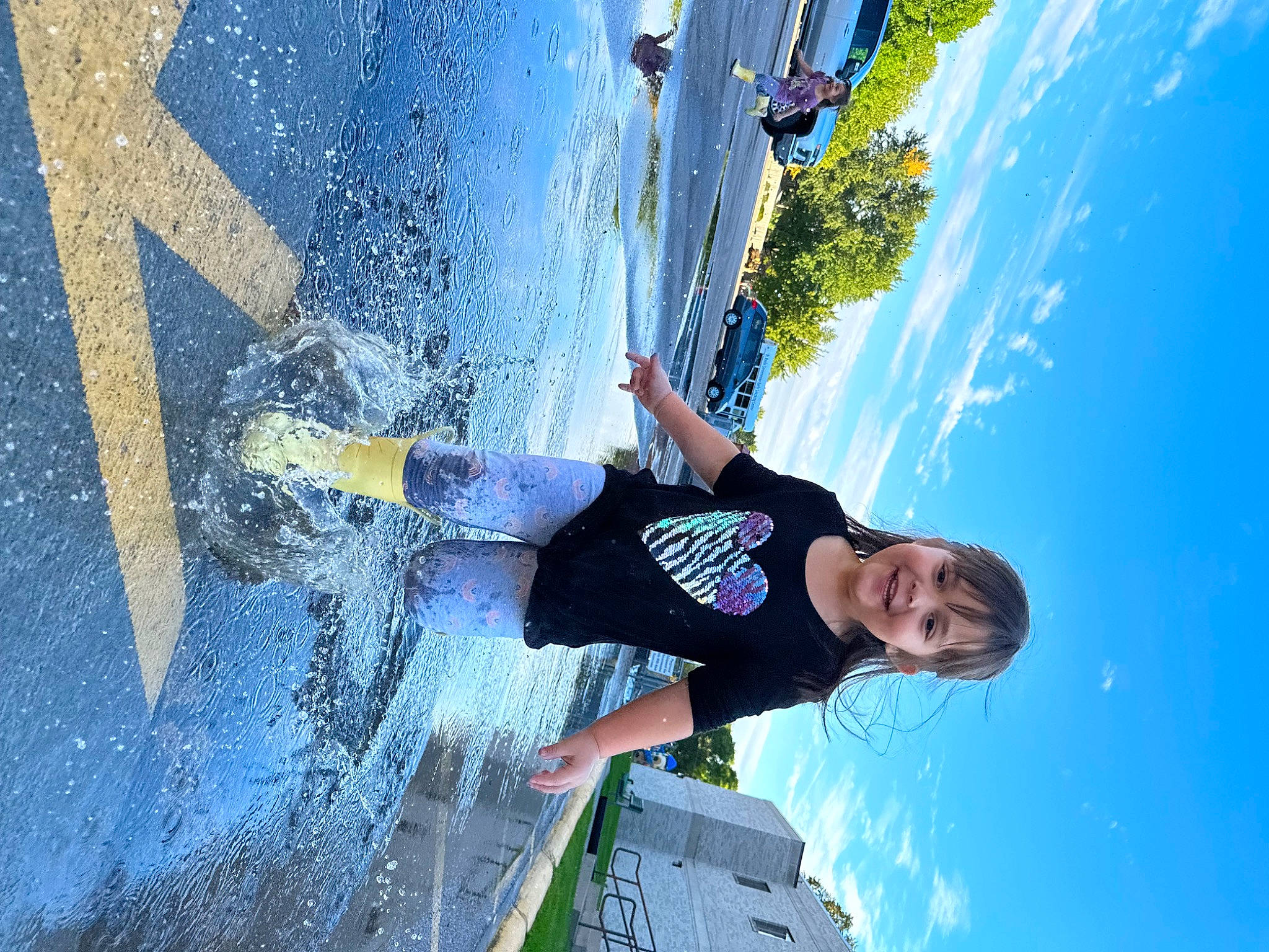 Jocelyn is registered to the contest to win money with this photo: adventure, asphalt, azure, blue, cloud, daytime, electric_blue, extreme_sport, fun, joy, leisure, person, recreation, shadow, sky, smile, sport_climbing, sports, travel, tree