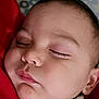 baby, sleeping, face, closeup, cheeks, eyelashes, red_blanket, infant, peaceful, skin, head, portrait, child, sleep, cozy, cute, soft_light, indoors, relaxation, young