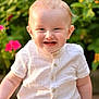 Mason joined the competition — help win amazing prizes! baby, child, smiling, outdoor, greenery, flowers, white_shirt, shorts, happy, portrait, sitting, sunlight, nature, cute, face, young_child, garden, blond_hair, buttoned_shirt, warm_light