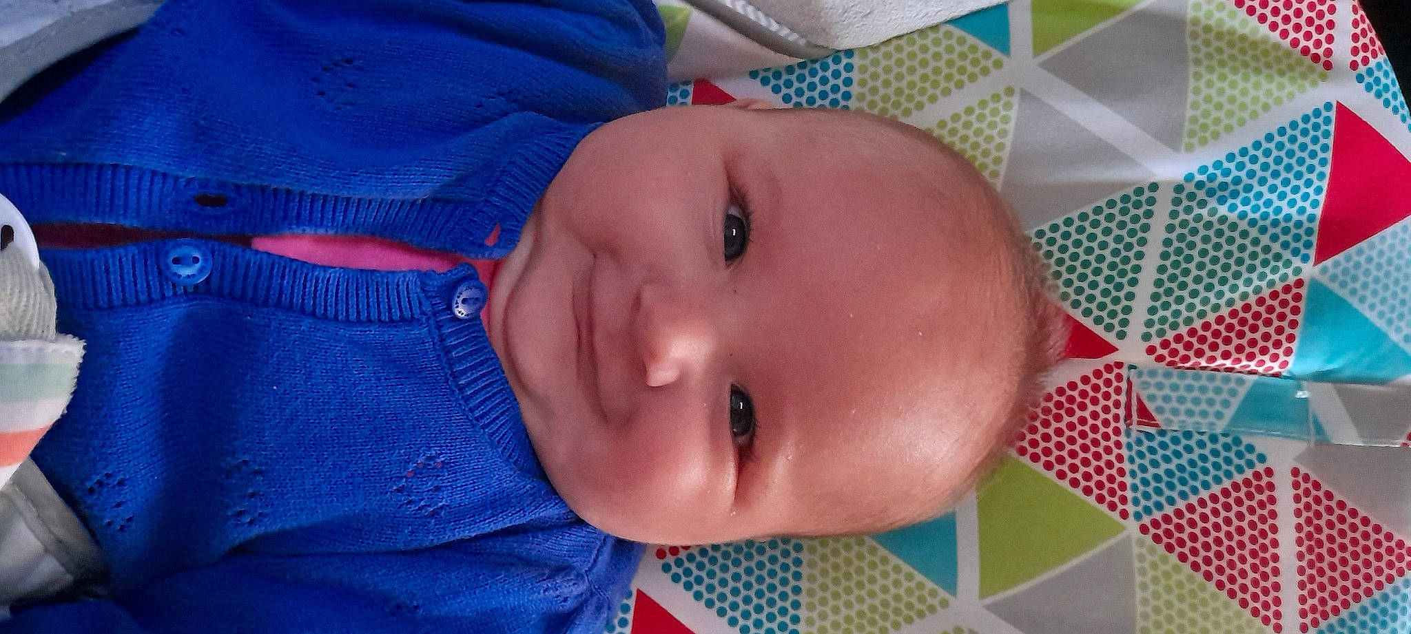 Félicia participe au concours pour gagner de l'argent avec cette photo : baby, baby_toddler_clothing, beauty, blue, cheek, child, eye, eyebrow, fun, head, human_body, iris, joy, lip, mouth, nose, pattern, person, pink, skin