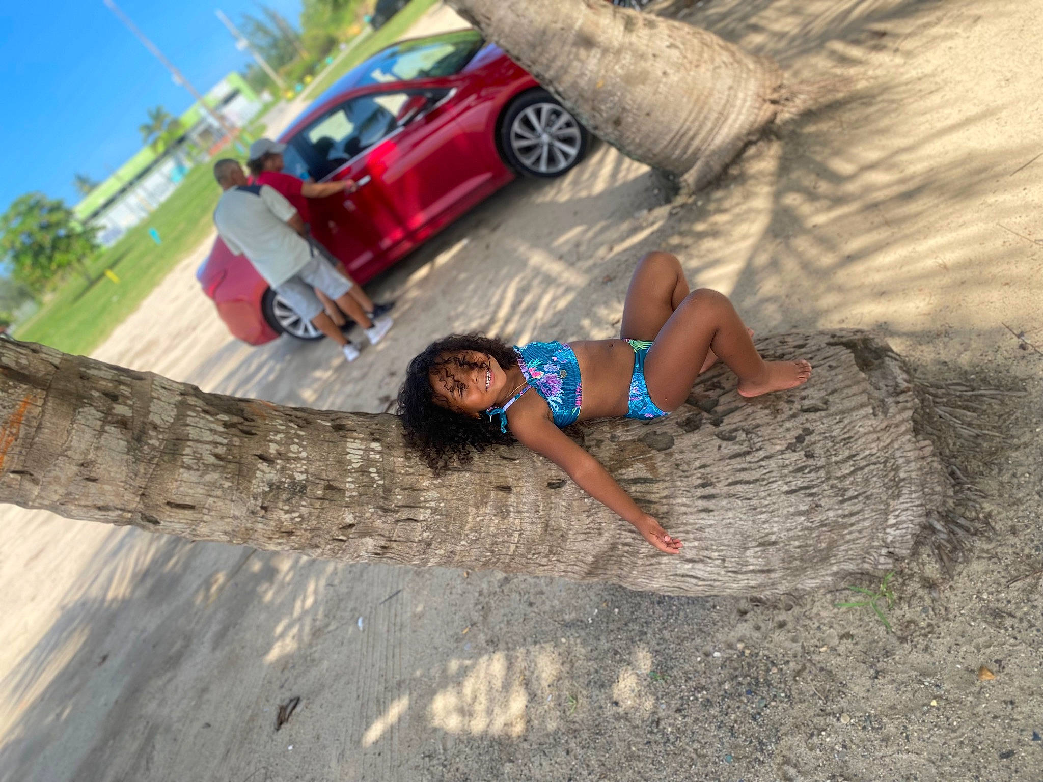 Leah joined the competition — help win amazing prizes! asphalt, automotive_tire, automotive_wheel_system, car, fun, grass, joy, land_vehicle, leisure, motor_vehicle, people_in_nature, person, plant, road_surface, sand, shorts, summer, tire, tree, vehicle