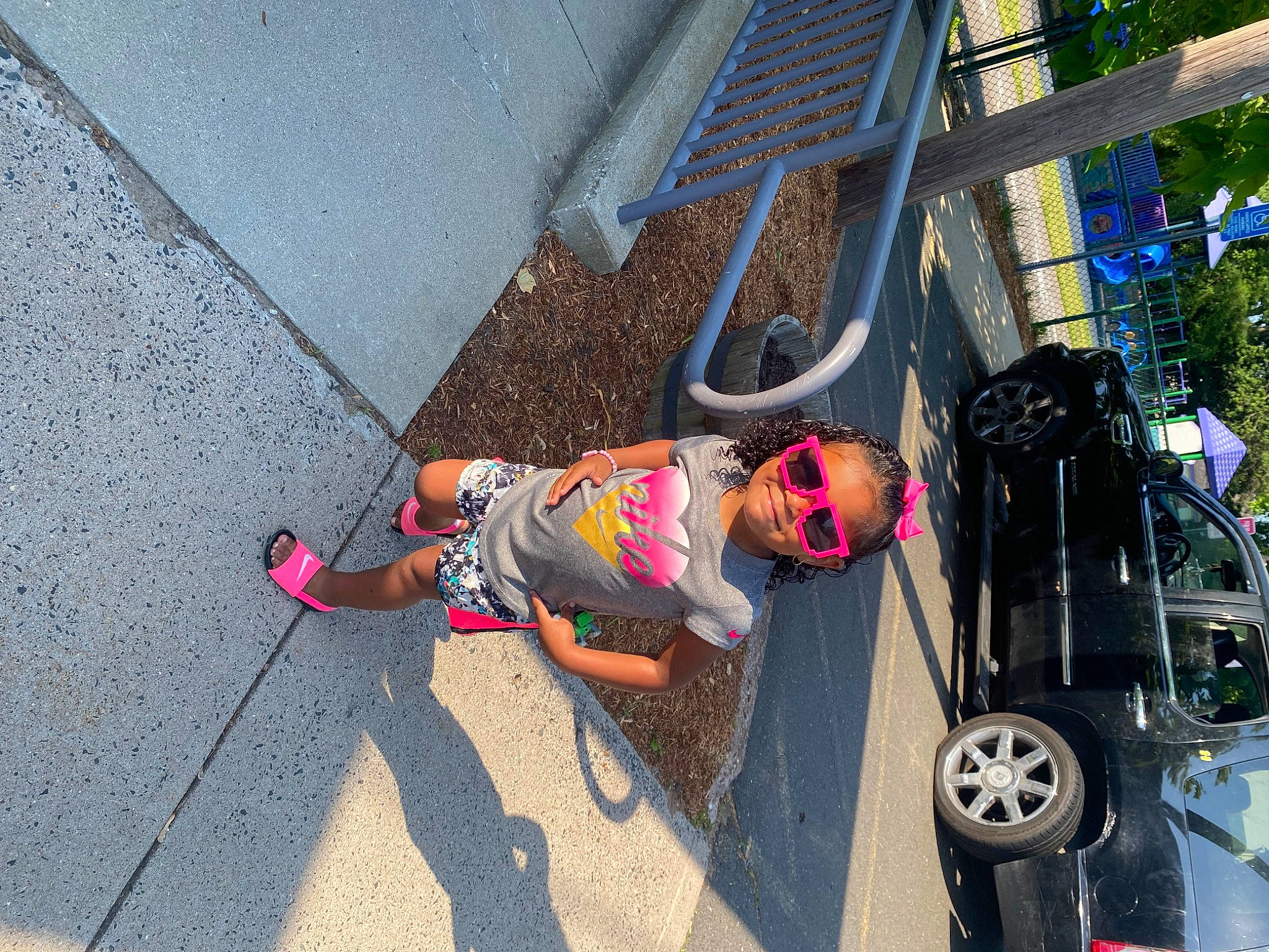 Leahanna joined the competition — help win amazing prizes! asphalt, automotive_exterior, automotive_tire, car, human_leg, leisure, motor_vehicle, person, rim, road, road_surface, shorts, sidewalk, spoke, thigh, tire, toddler, tree, vehicle, vehicle_door