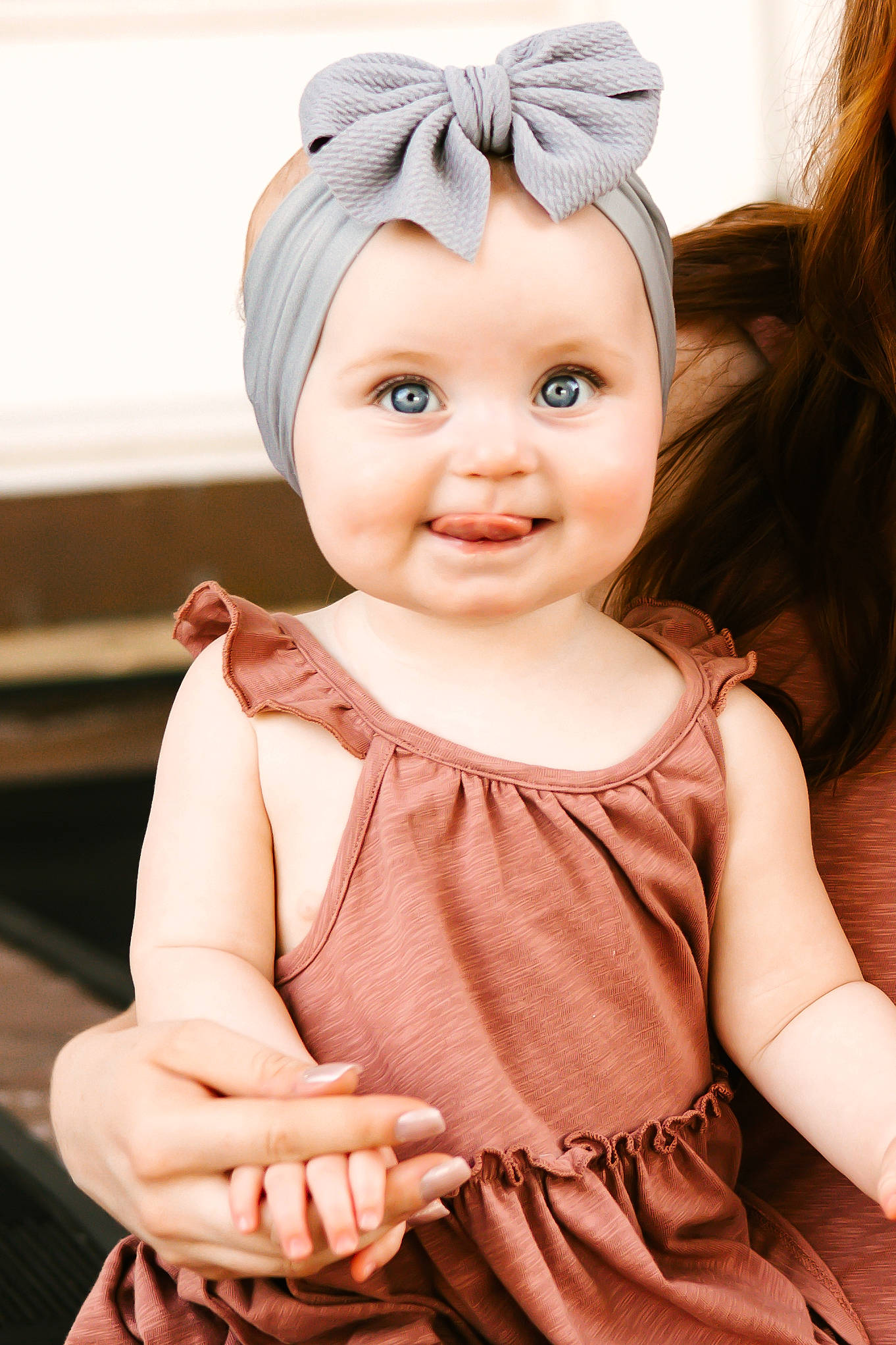 Saylor is registered to the contest to win money with this photo: baby, baby_toddler_clothing, cap, cheek, chin, dress, eye, eyelash, happy, headgear, headwear, iris, joy, lip, neck, one_piece_garment, person, pink, skin, sleeve