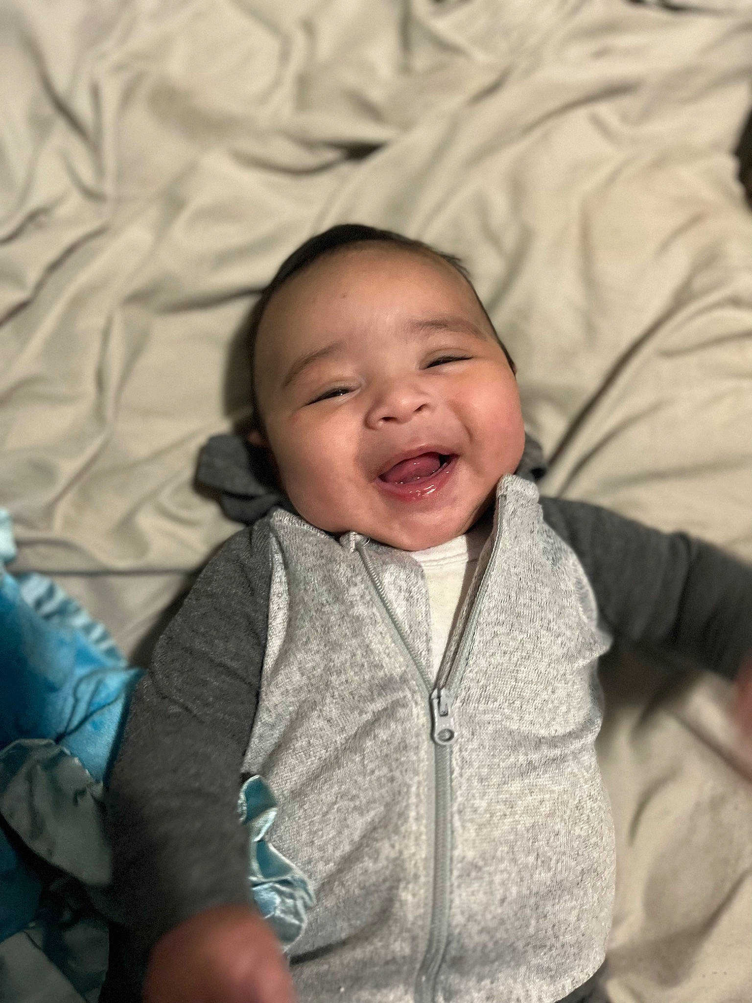 Amari joined the competition — help win amazing prizes! baby, baby_laughing, baby_toddler_clothing, cheek, child, comfort, facial_expression, flash_photography, fun, happy, iris, mouth, nose, organ, person, sitting, skin, sleeve, smile, textile
