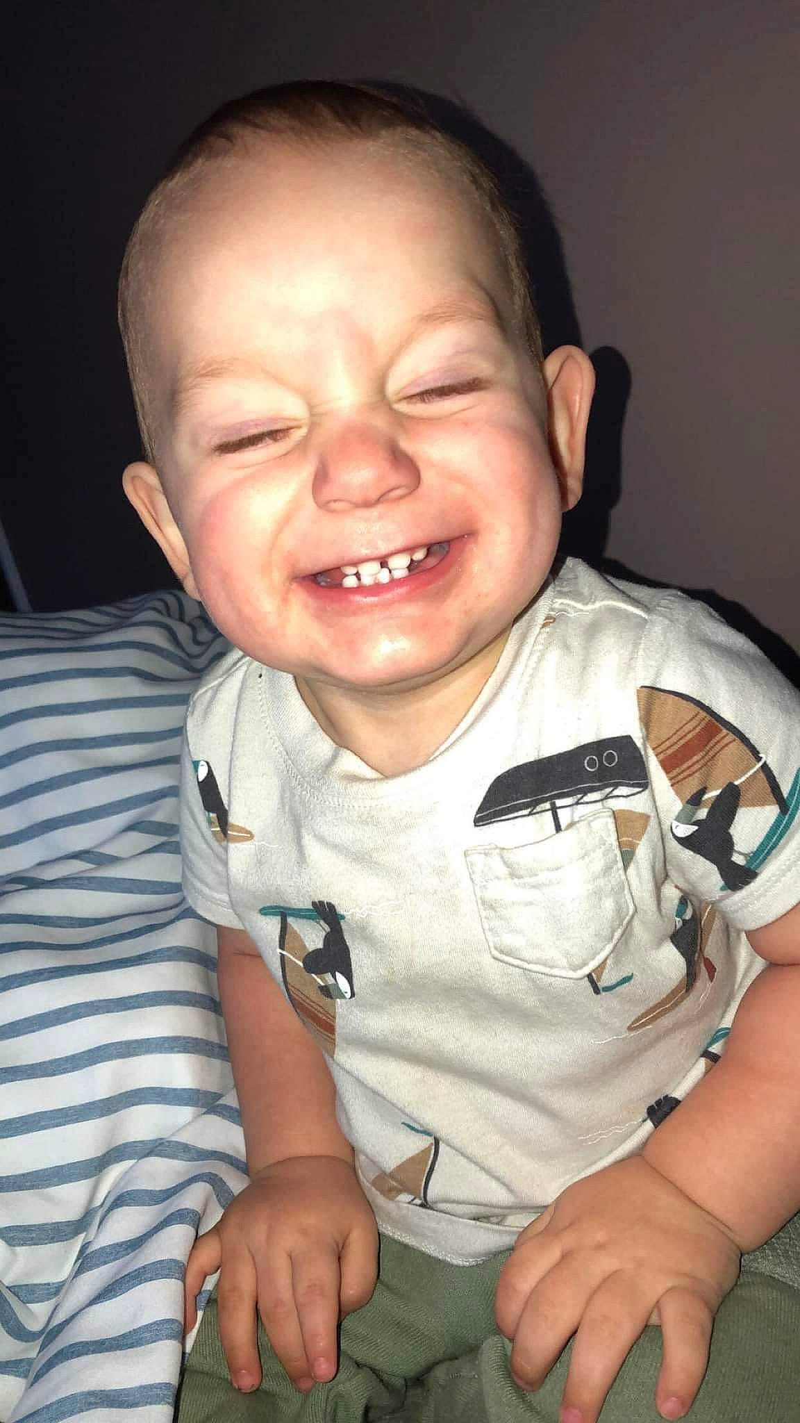 Chandler is registered to the contest to win money with this photo: baby, baby_toddler_clothing, cheek, comfort, cool, finger, gesture, happy, human_body, iris, jaw, joy, lip, mouth, neck, nose, person, skin, sleeve, smile