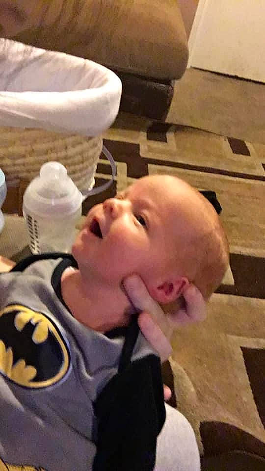 Ewan is registered to the contest to win money with this photo: baby, baby_products, baby_toddler_clothing, cheek, child, comfort, flooring, fun, hairstyle, happy, hardwood, mouth, person, play, room, smile, t_shirt, thumb, toddler, vacation