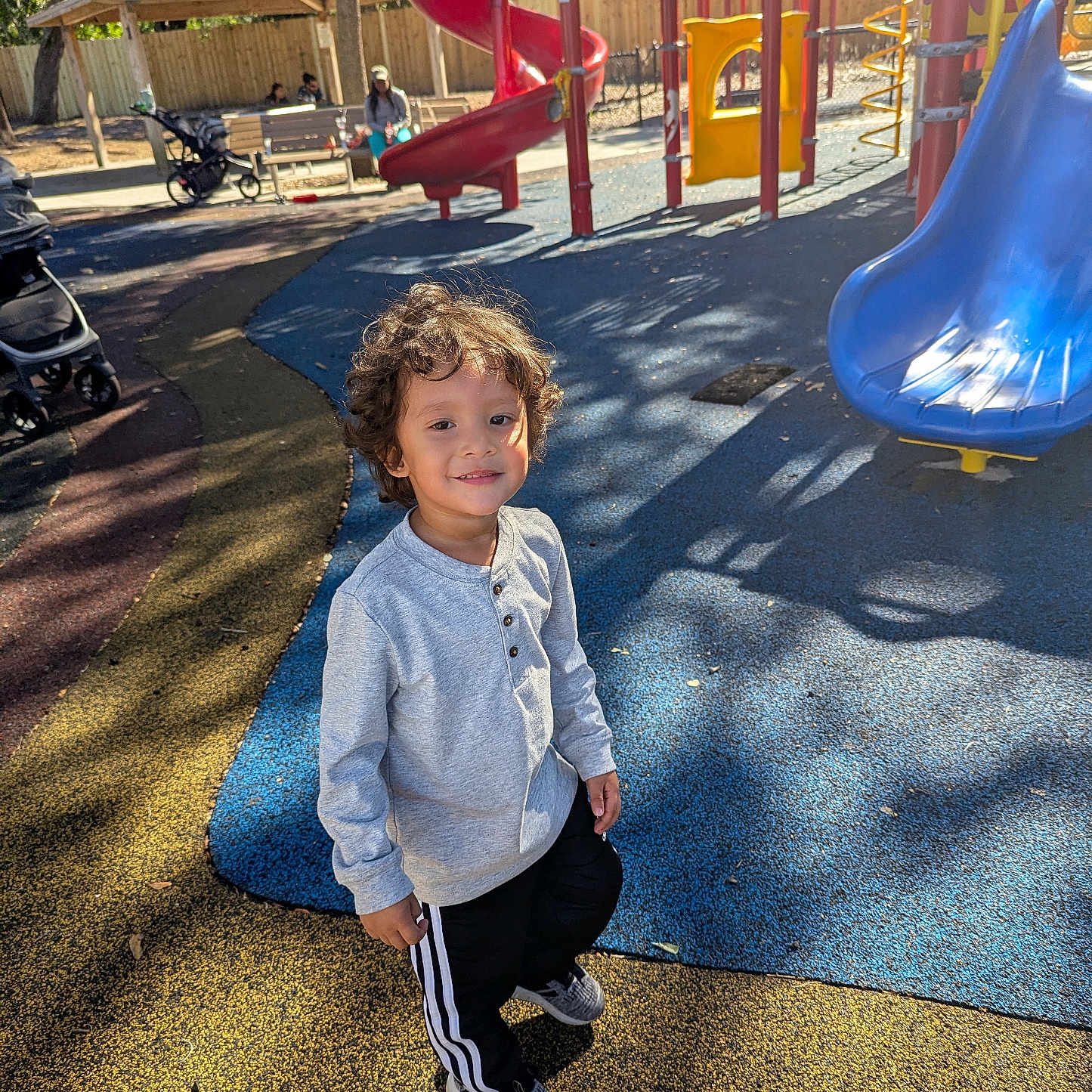 Jovin is registered to the contest to win money with this photo: bench, boy, child, clothing, face, footwear, furniture, grass, head, male, nature, outdoorplayarea, outdoors, park, person, photography, plant, playarea, portrait, shoe
