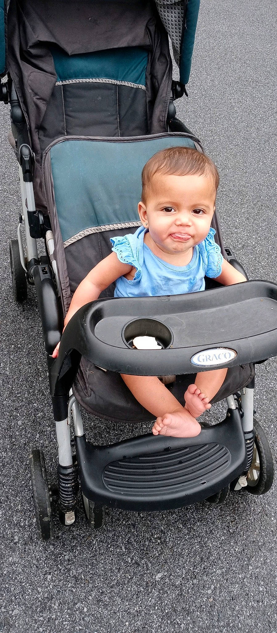 Sophia joined the competition — help win amazing prizes! arm, automotive_design, baby, baby_carriage, baby_safety, baby_toddler_clothing, black, blue, chair, comfort, head, human_body, person, photograph, plant, product, red, tire, toddler, wheel