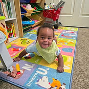 Thunder joined the competition — help win amazing prizes! baby, child, smiling, playroom, rug, alphabet, toy, bookshelf, carpet, floor, indoor, colorful, clothing, bib, person, happy, infant, play, furniture, cute