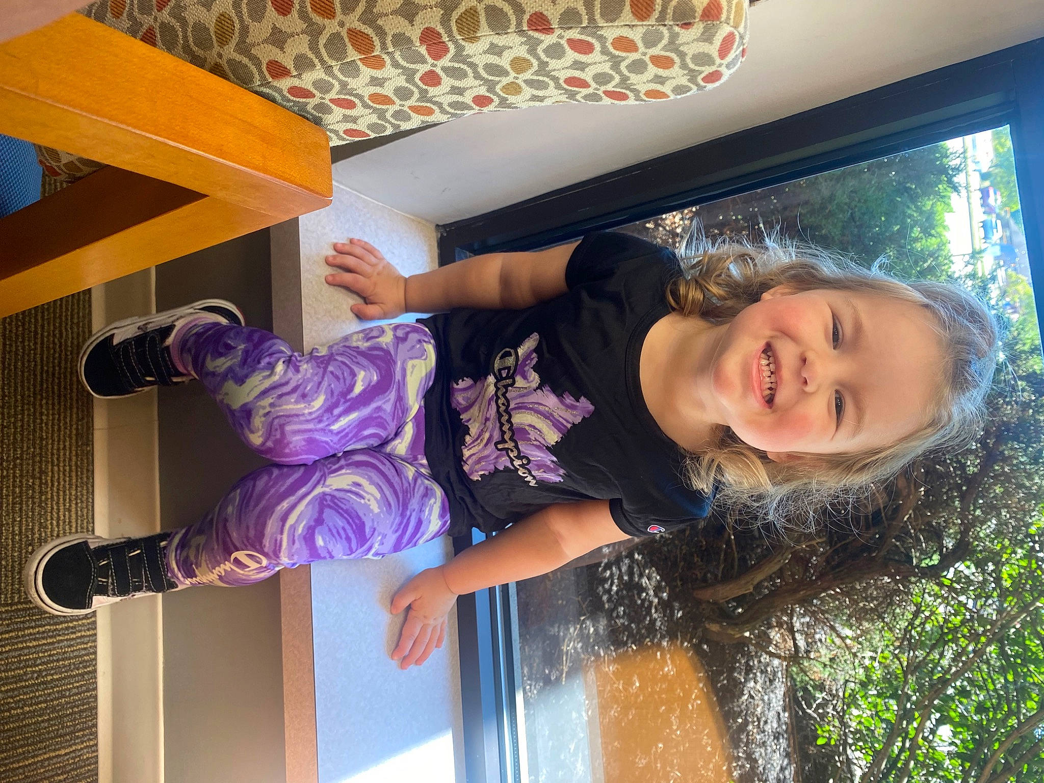 Ahlani is registered to the contest to win money with this photo: child, fun, happy, joy, leisure, magenta, person, plant, purple, room, smile, stairs, toddler, tree, vacation, window