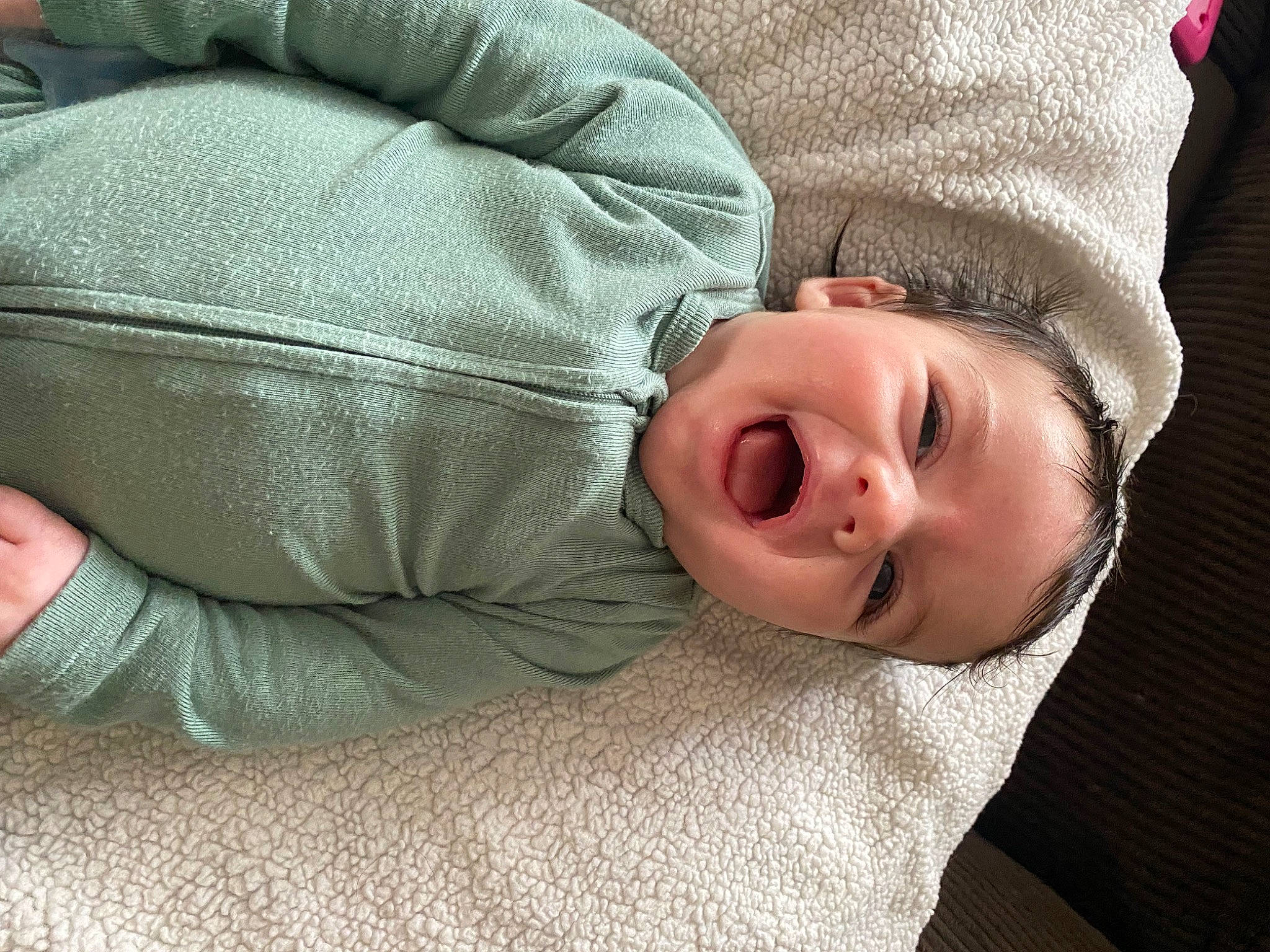 Asher is registered to the contest to win money with this photo: arm, baby, baby_toddler_clothing, cheek, child, comfort, grass, hand, linens, nap, nose, person, portrait_photography, sitting, skin, sleep, sleeve, textile, toddler, tree