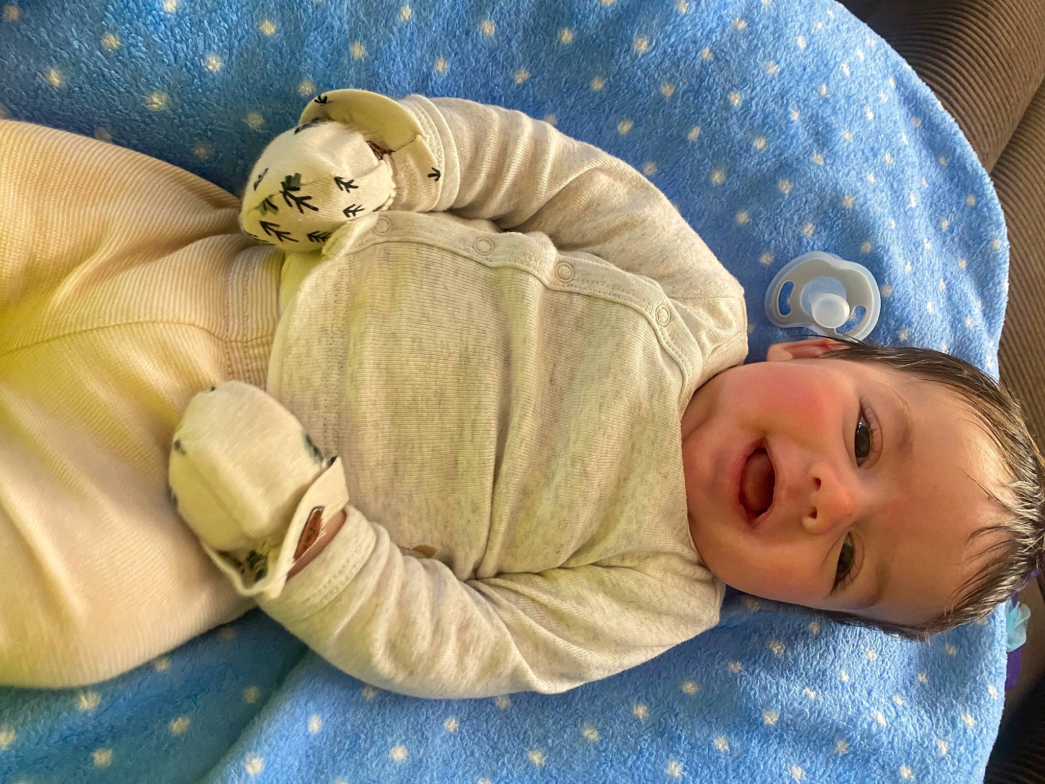 Asher is registered to the contest to win money with this photo: baby, baby_products, baby_sleeping, baby_toddler_clothing, bedding, bedtime, child, comfort, couch, linens, nap, person, room, skin, sleeve, smile, stuffed_toy, teddy_bear, textile, toddler