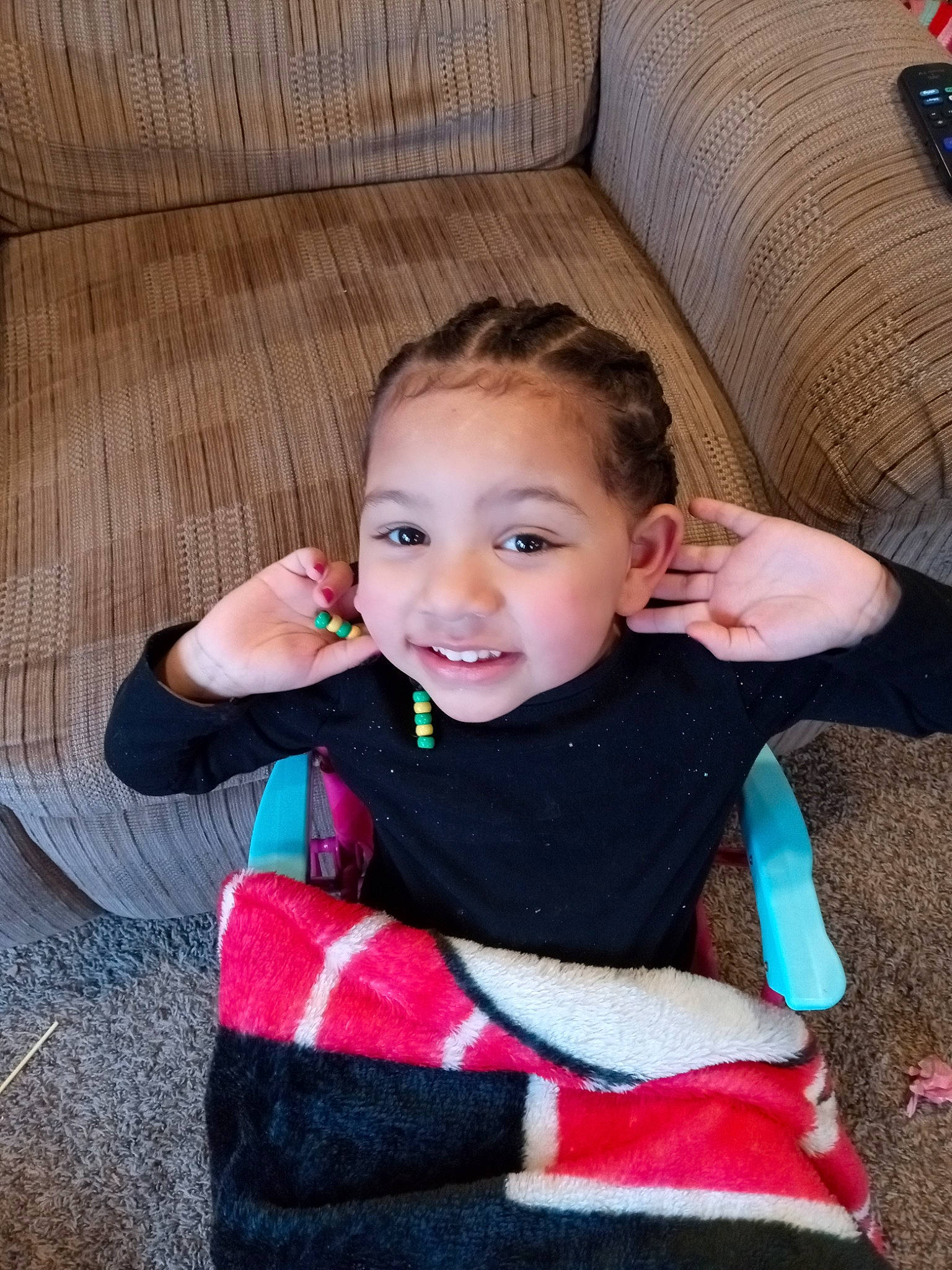 Luxianna is registered to the contest to win money with this photo: baby, baby_toddler_clothing, cheek, child, comfort, couch, eye, finger, fun, hair, happy, head, iris, joy, lip, nose, person, skin, sleeve, smile