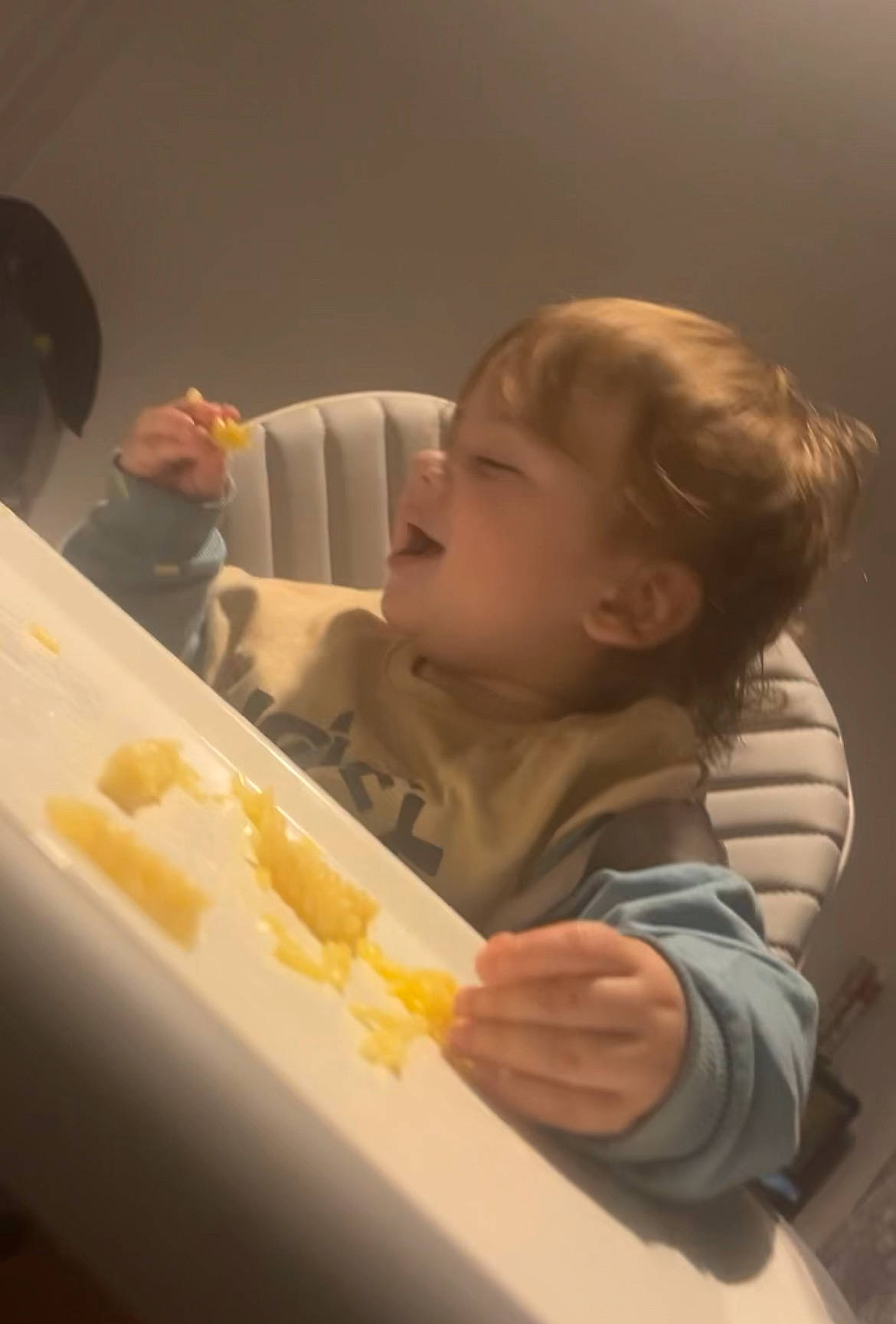 Jacob is registered to the contest to win money with this photo: baby, baby_toddler_clothing, breakfast, chair, child, comfort, comfort_food, cuisine, dish, eating, food, hand, ingredient, junk_food, person, recipe, room, sitting, sweetness, tableware