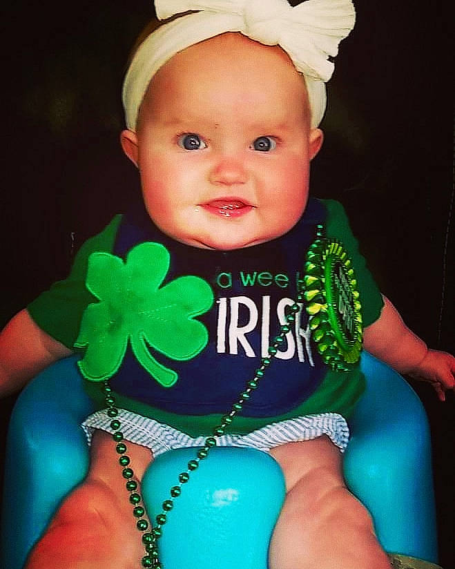 Hallie Jane is registered to the contest to win money with this photo: aqua, baby, baby_toddler_clothing, cap, child, cool, eye, face, facial_expression, finger, happy, head, headgear, human_body, nail, person, pink, skin, sleeve, thigh