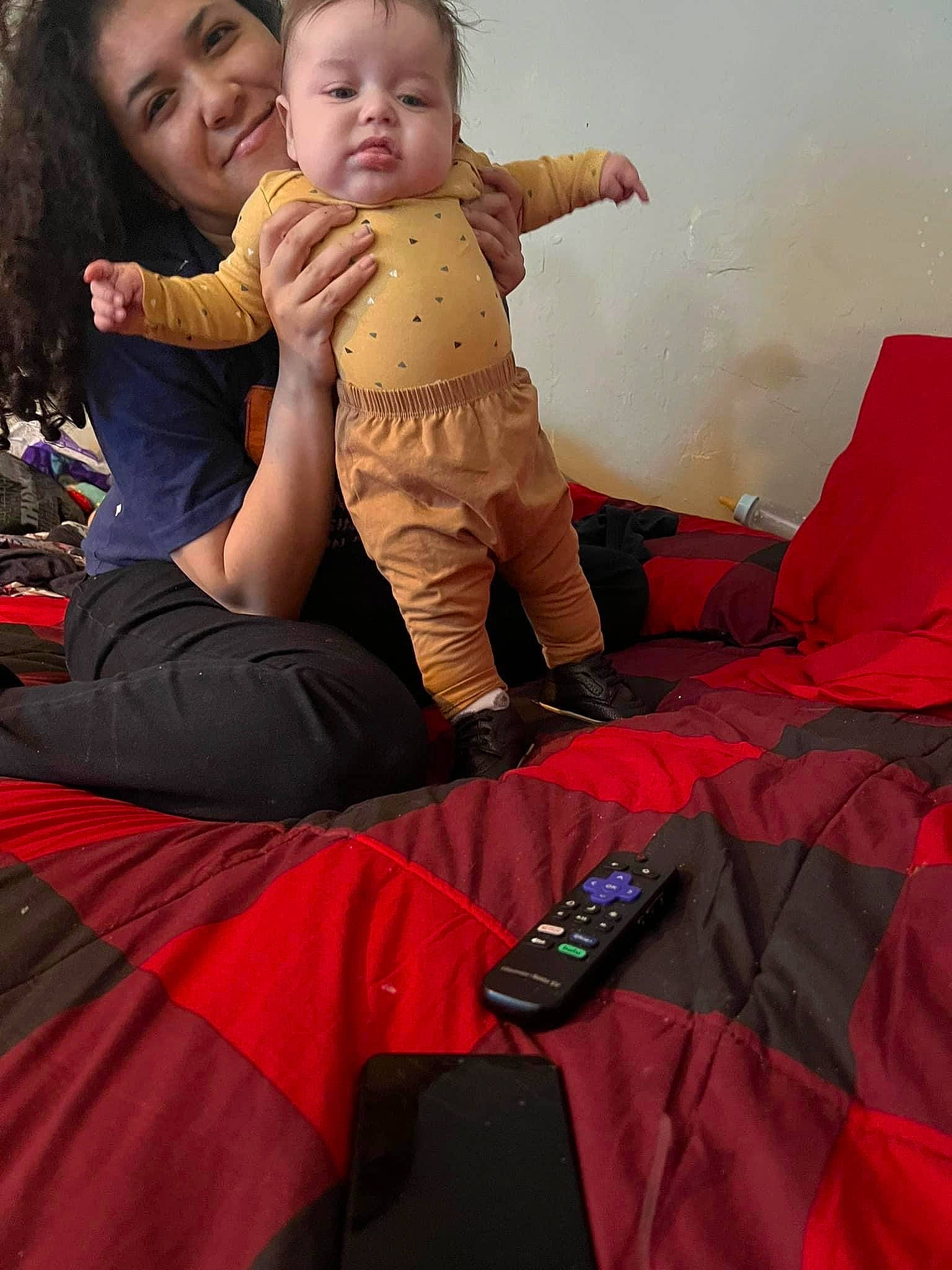 Braylon is registered to the contest to win money with this photo: baby, bag, carmine, child, comfort, finger, foot, fun, gesture, happy, human_body, joy, lap, luggage_and_bags, people_in_nature, person, pink, red, skin, smile