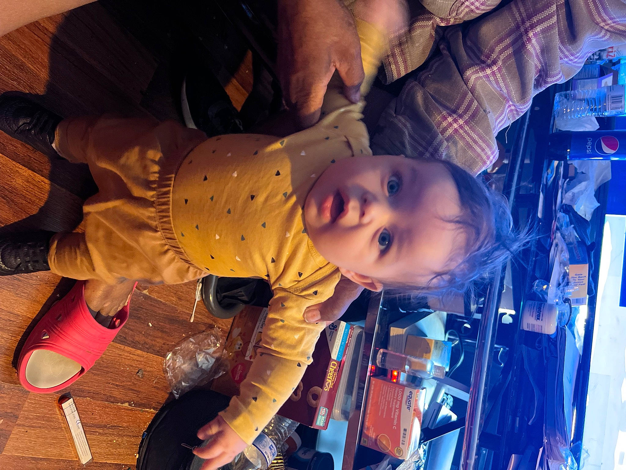 Braylon is registered to the contest to win money with this photo: automotive_lighting, black_hair, child, cool, electric_blue, flash_photography, flooring, fun, happy, hat, night, pattern, person, portrait_photography, smile, space, surprise, toddler, wood