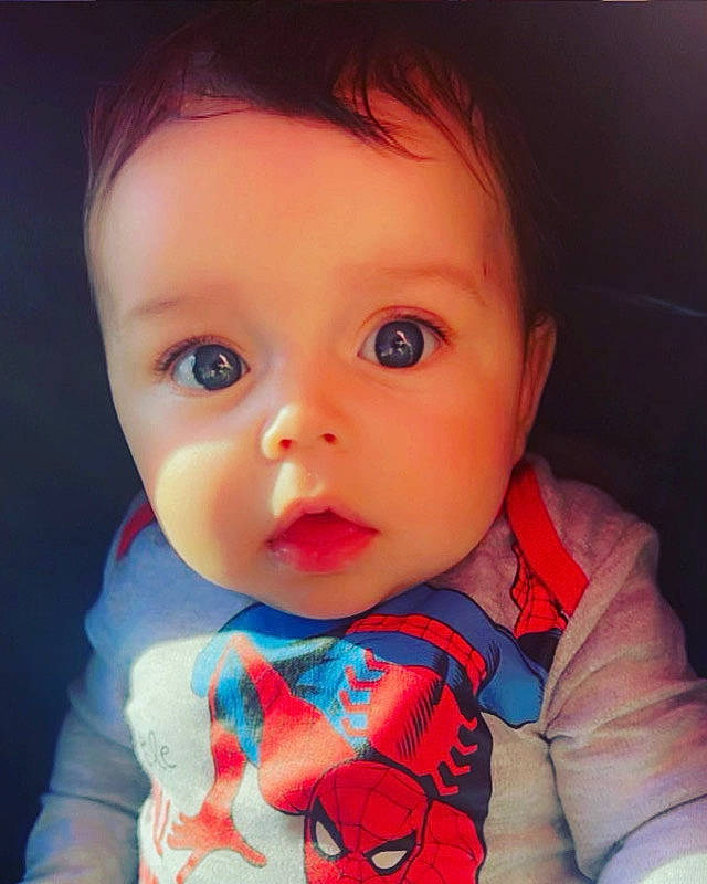 Braylon is registered to the contest to win money with this photo: baby, baby_toddler_clothing, cheek, chin, collar, cool, dress, ear, eyebrow, eyelash, happy, human_body, iris, lip, mouth, neck, nose, outerwear, person, skin