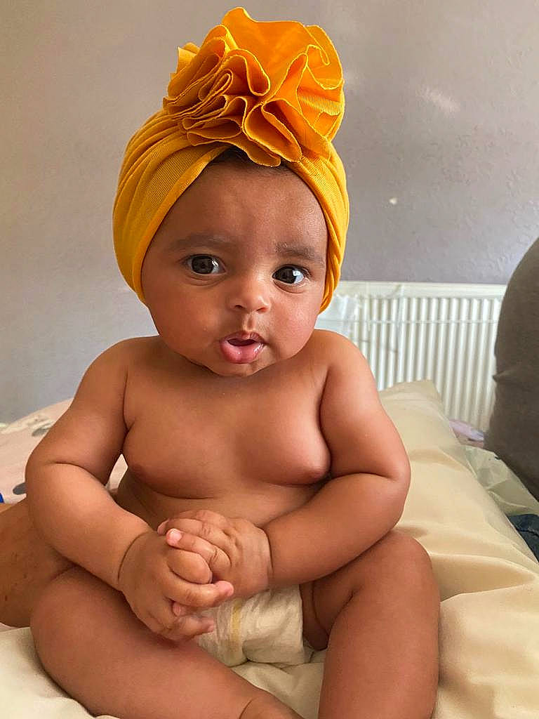 Lottie joined the competition — help win amazing prizes! baby, cap, chin, comfort, eye, eyebrow, face, finger, happy, head, headwear, human_body, lip, mouth, nail, neck, nose, person, skin, stomach