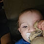 child, baby, pacifier, stuffed_animal, toy, close_up, indoor, blue_shirt, face, hand, plush, comfort, infant, young_child, portrait, cuddle, cute, soft_toy, baby_toy, childhood