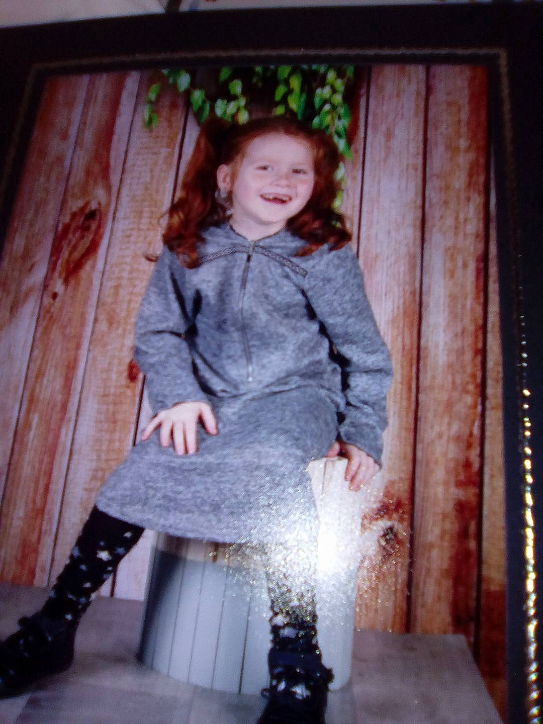 Mael Ann participe au concours pour gagner de l'argent avec cette photo : child, dress, fun, girl, joy, outerwear, person, sitting, smile, snapshot, standing, textile, toddler