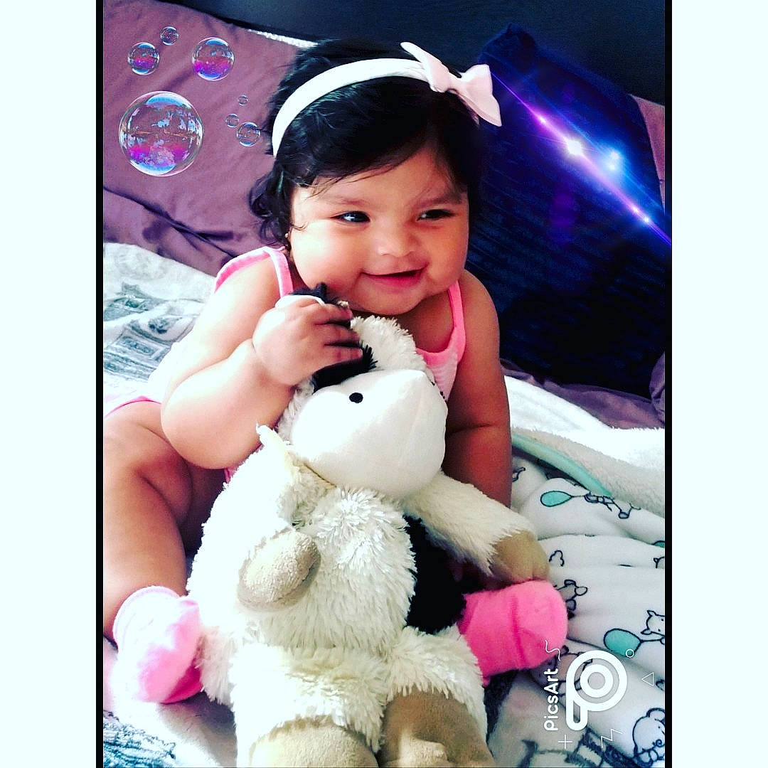 Keidy is registered to the contest to win money with this photo: baby, beauty, cheek, child, ear, hand, happy, human, joy, love, nose, person, pink, play, plush, skin, smile, snapshot, stuffed_toy, teddy_bear