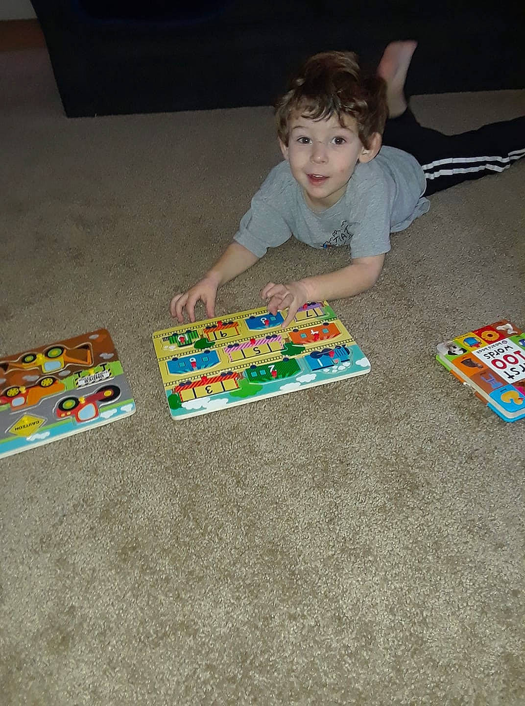 Tanner is registered to the contest to win money with this photo: child, fun, games, person, play, product, recreation, tabletop_game, toddler, toy