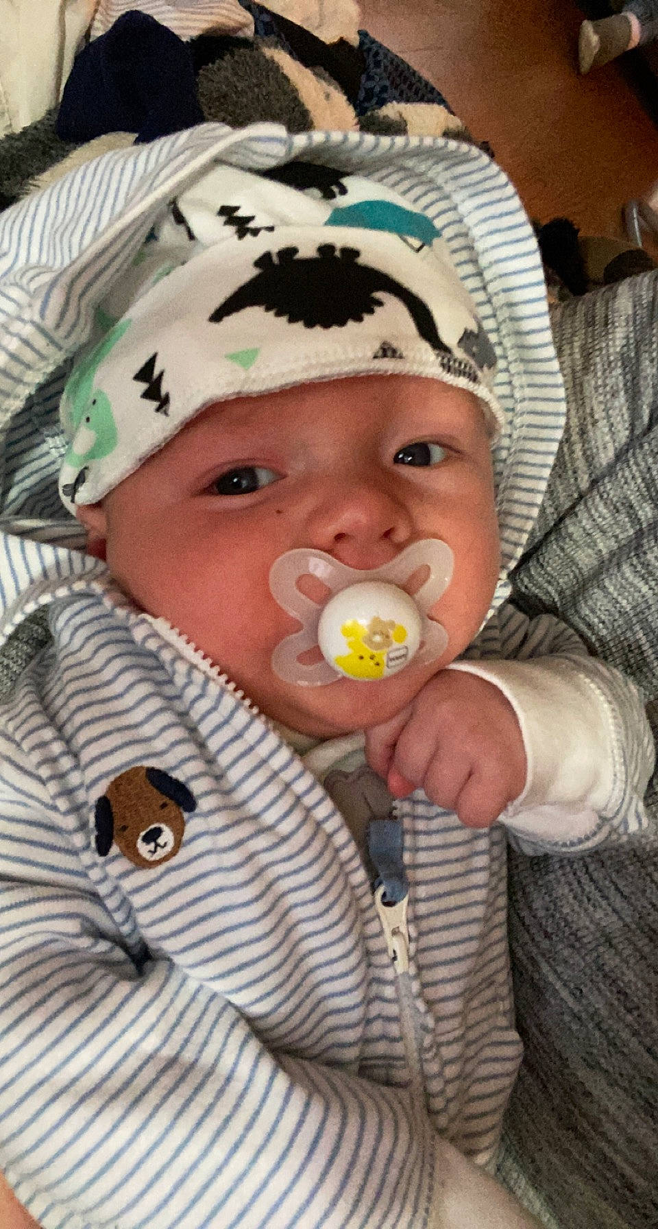 Atticus joined the competition — help win amazing prizes! baby, baby_products, baby_toddler_clothing, beanie, cheek, child, comfort, drinkware, ear, eye, eyelash, fun, happy, headwear, iris, knit_cap, mouth, nose, person, product