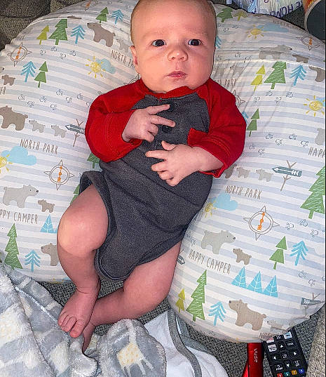 Atticus joined the competition — help win amazing prizes! baby, baby_toddler_clothing, cheek, child, comfort, dress, face, finger, hand, head, human_body, human_leg, knee, lap, leg, person, skin, sleeve, sock, thigh