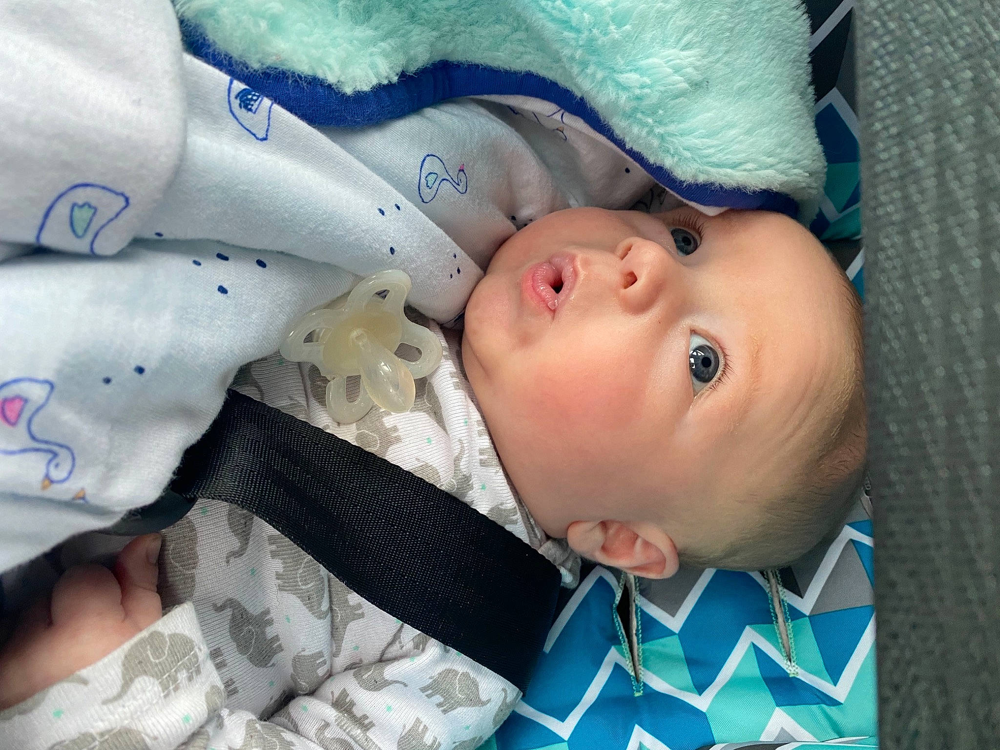 Atticus joined the competition — help win amazing prizes! baby, baby_products, baby_toddler_clothing, blue, cheek, child, comfort, electric_blue, eye, face, iris, linens, lip, nose, pattern, people, person, skin, sleeve, textile