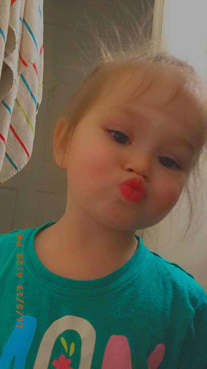 Aubree is registered to the contest to win money with this photo: blond, cheek, child, chin, ear, eye, eyebrow, face, forehead, fun, hair, hairstyle, head, iris, lip, neck, nose, person, photography, skin