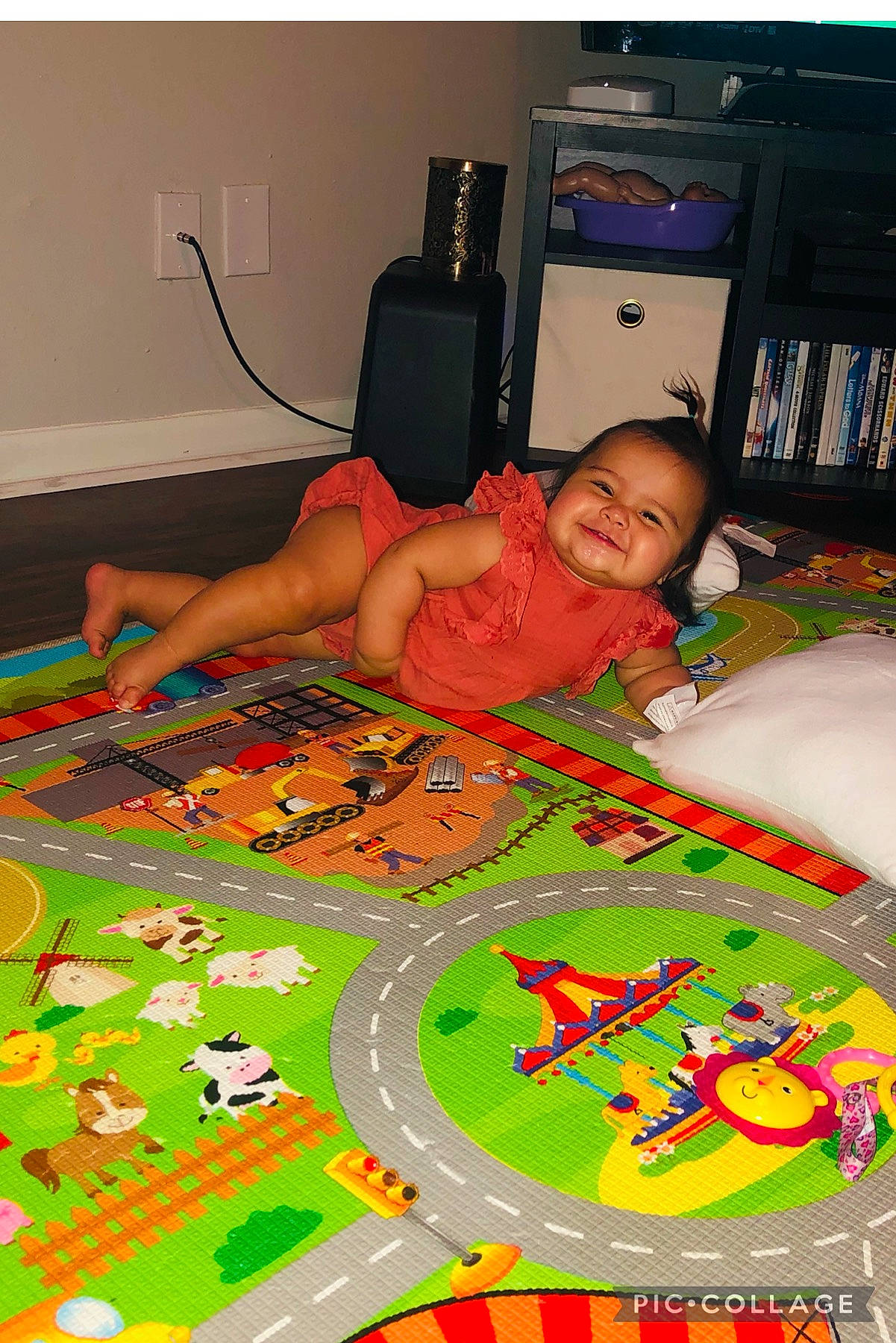 Abby is registered to the contest to win money with this photo: bed, bookcase, child, comfort, floor, flooring, fun, games, home_appliance, indoor_games_and_sports, joy, leisure, linens, pattern, person, play, recreation, room, shelf, toddler