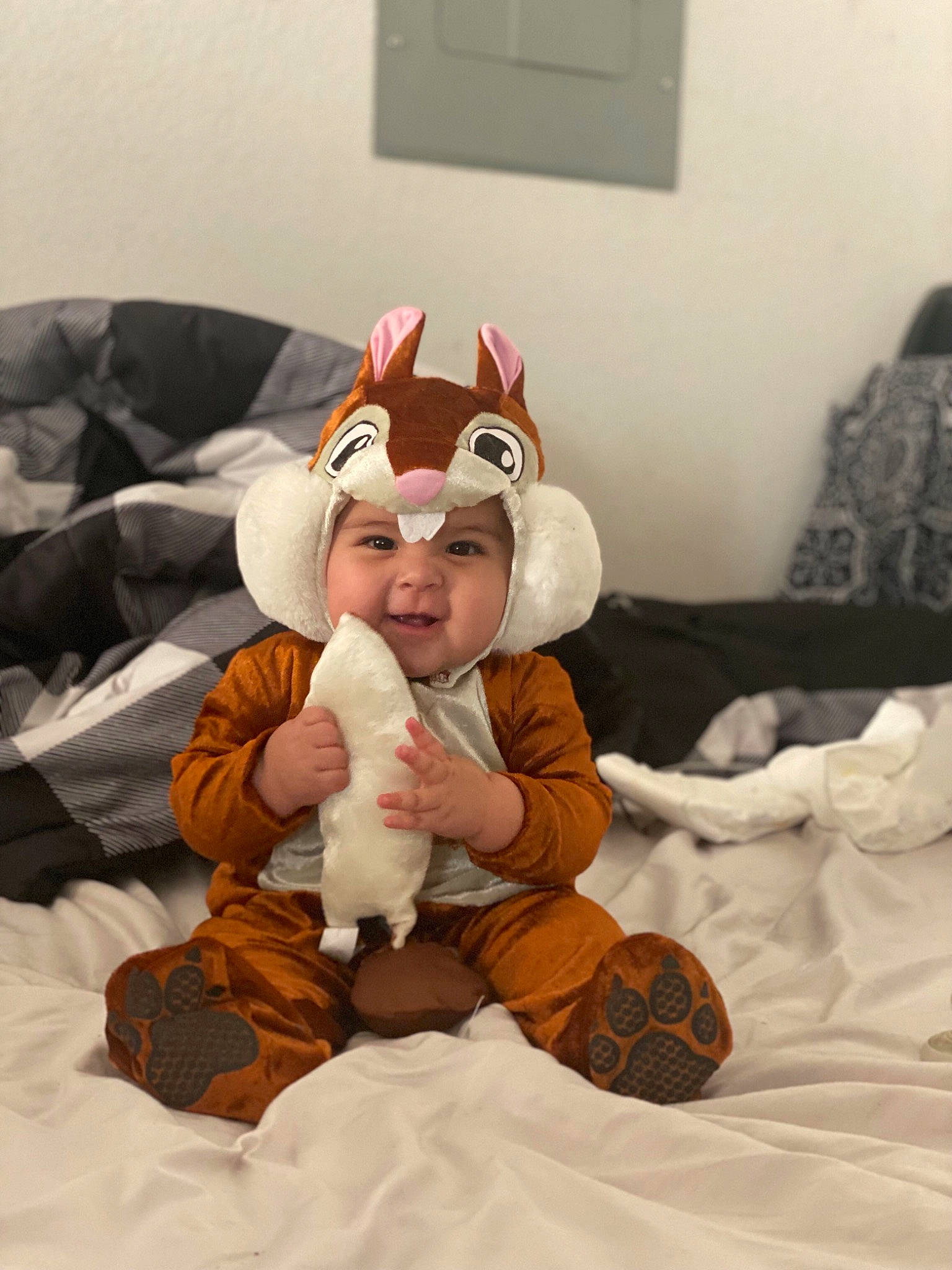 Abby joined the competition — help win amazing prizes! baby, child, comfort, costume, couch, event, fictional_character, fun, fur, gesture, glove, happy, hat, headwear, linens, person, picture_frame, plush, room, smile