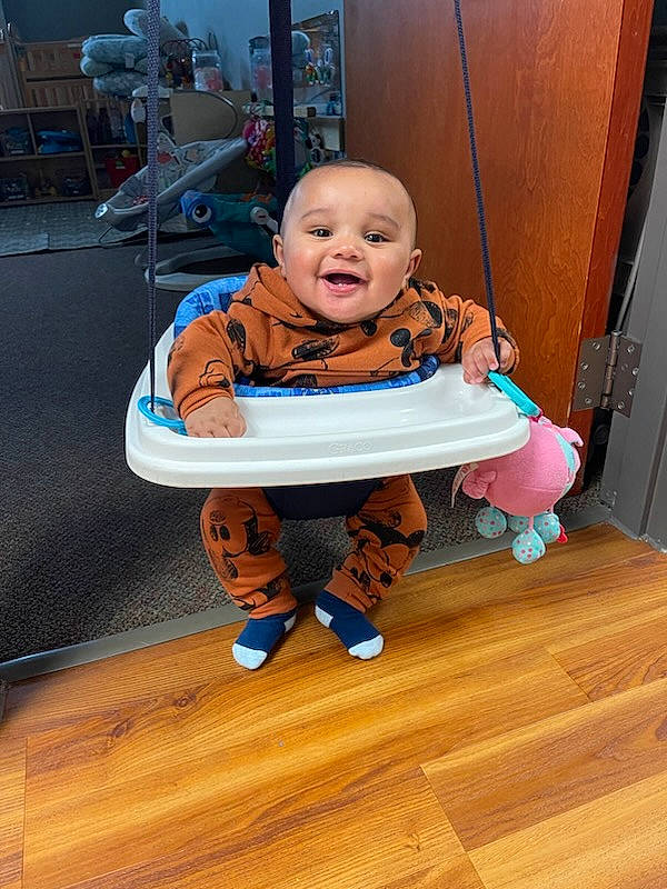 Brody joined the competition — help win amazing prizes! baby, baby_safety, baby_toddler_clothing, chair, child, comfort, electric_blue, floor, flooring, fun, happy, hardwood, laminate_flooring, person, smile, thumb, toddler, varnish, wood, wood_flooring