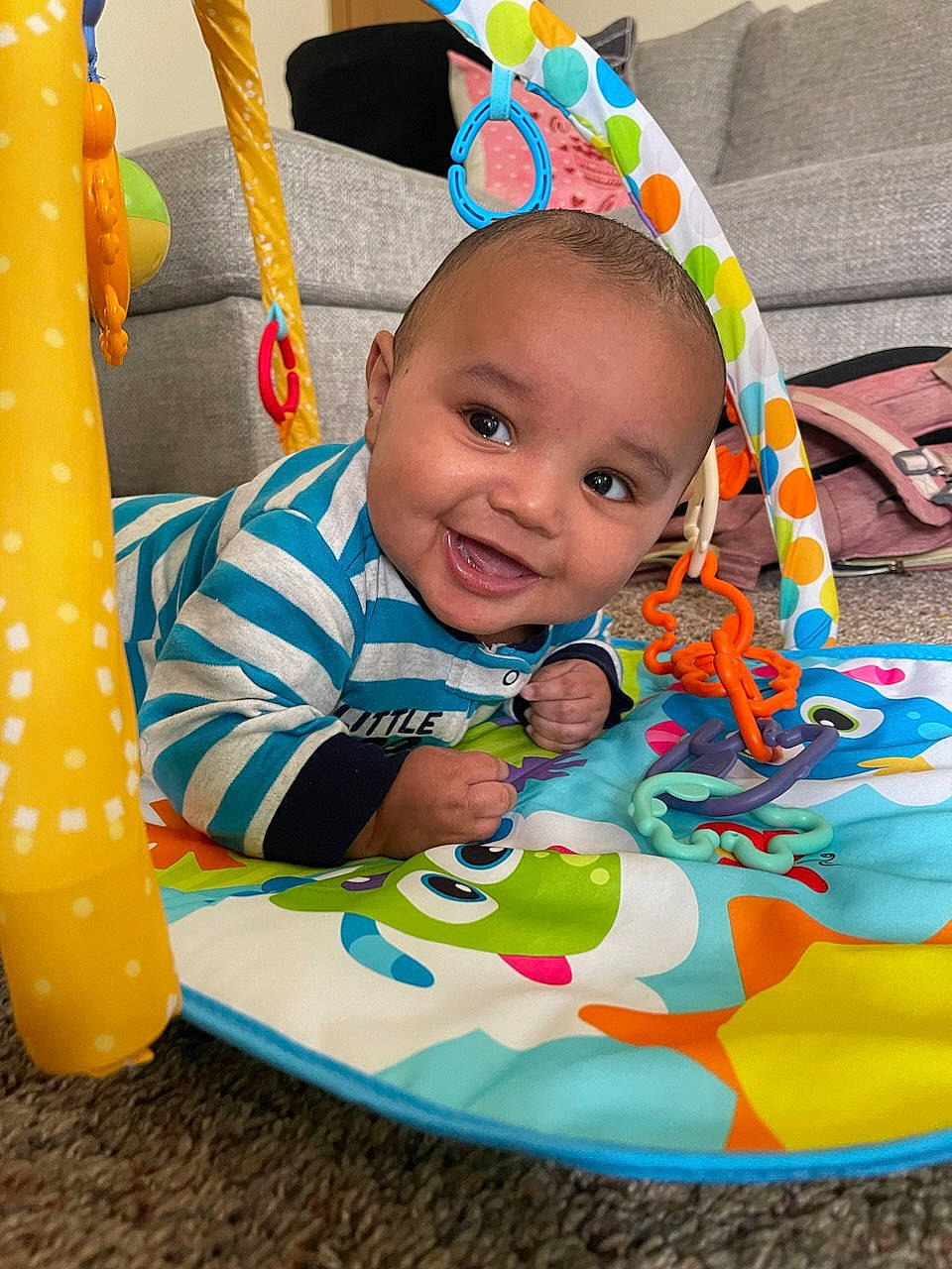 Brody is registered to the contest to win money with this photo: baby, baby_products, baby_toddler_clothing, baby_toys, cheek, child, event, facial_expression, fun, happy, head, joy, leisure, party_hat, person, play, product, sitting, skin, smile