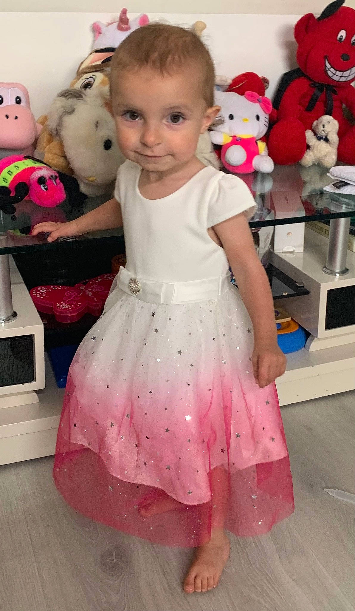 Laelia participe au concours pour gagner de l'argent avec cette photo : baby, baby_toddler_clothing, cheek, child, dress, fun, happy, person, photograph, pink, product, red, skin, sleeve, snapshot, standing, textile, toddler, toy, waist