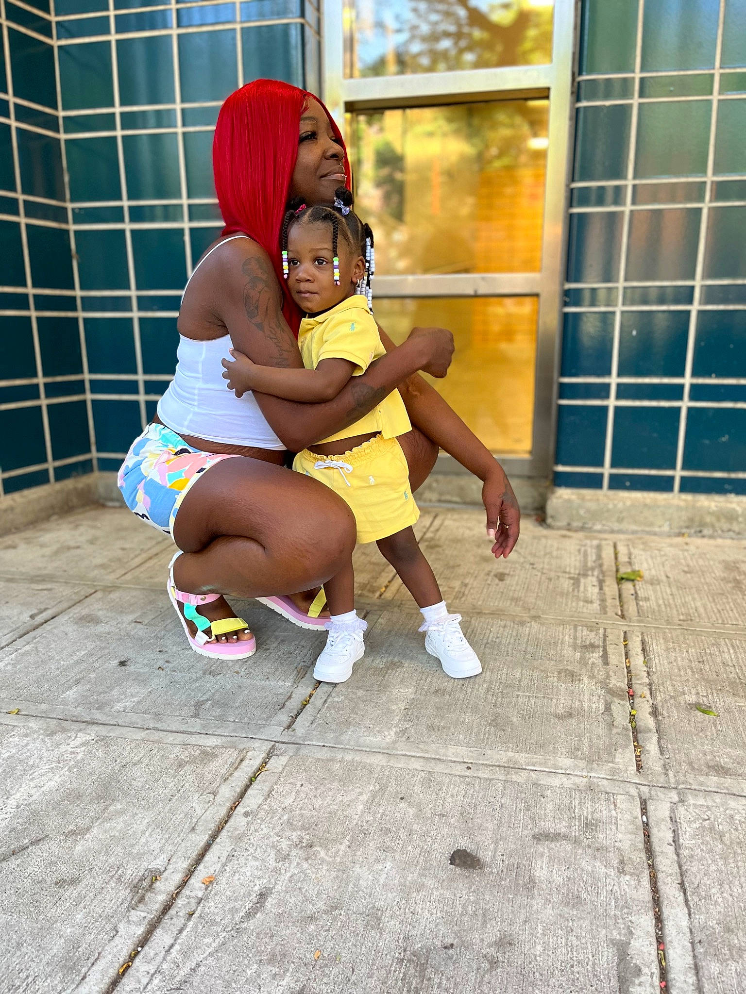 Wyntermarie is registered to the contest to win money with this photo: cap, child, flooring, foot, fun, happy, hat, human_leg, joy, knee, leg, leisure, person, recreation, sandal, sidewalk, sitting, sneakers, street, thigh