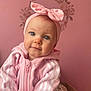 Soline a rejoint le concours — aidez-le/la à gagner de superbes lots ! baby, infant, blue_eyes, pink_headband, bow, pink_hoodie, white_stripes, zipper, rosy_cheeks, portrait, closeup, floral_wall_decal, pink_wall, sitting, smile, hands, hood, bedding, adorable, child