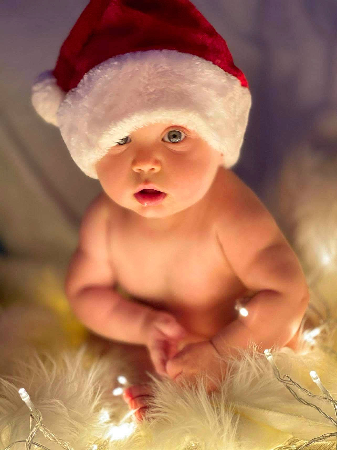 Tanner joined the competition — help win amazing prizes! baby, cheek, christmas, christmas_decoration, christmas_eve, costume, costume_accessory, costume_hat, event, fictional_character, headgear, holiday, ornament, pleased