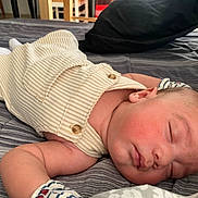 Saione Ho Ching joined the competition — help win amazing prizes! baby, newborn, sleeping, infant, bed, bedding, pillow, bedroom, portrait, closeup, peaceful, resting, onesie, striped_clothing, face, skin, ear, arm, cozy, indoor