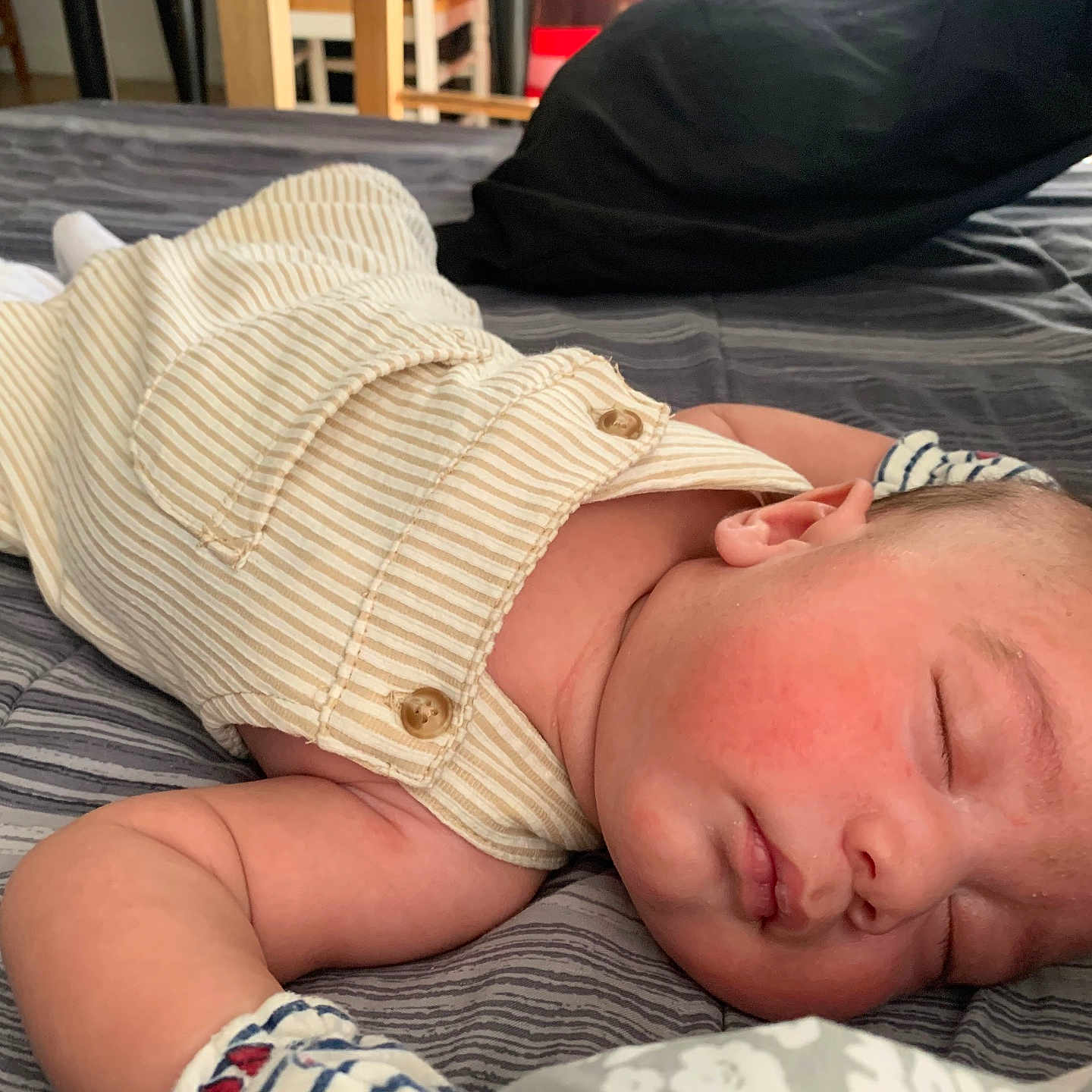 Saione Ho Ching joined the competition — help win amazing prizes! baby, newborn, sleeping, infant, bed, bedding, pillow, bedroom, portrait, closeup, peaceful, resting, onesie, striped_clothing, face, skin, ear, arm, cozy, indoor