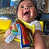 Arabella joined the competition — help win amazing prizes! baby, babylaughing, clothing, face, happy, head, person, scarf, text